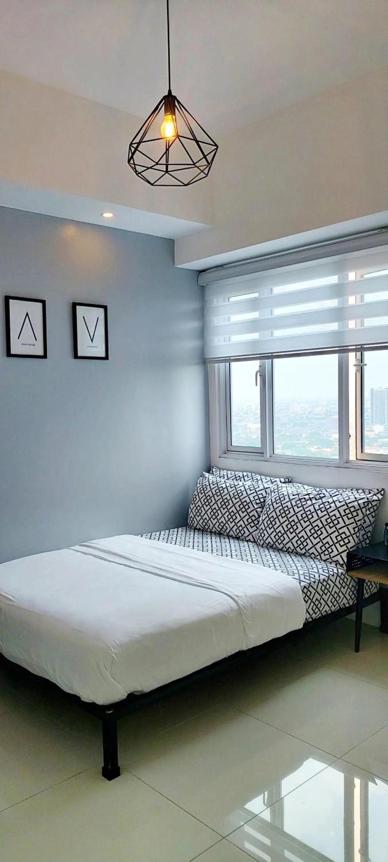 Bed in Condo Studio Luxe in Princeton Residences