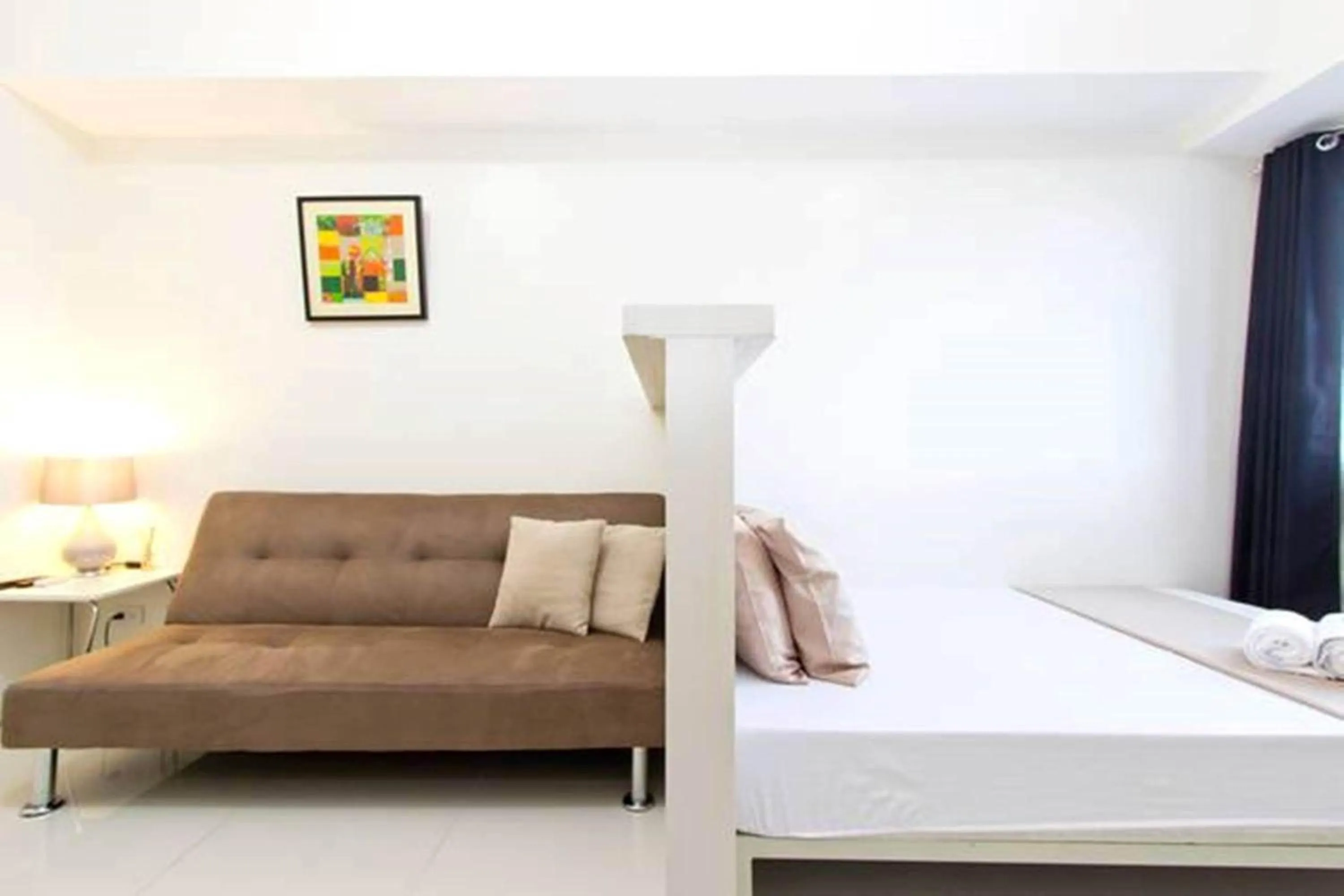 Bed in Condo Studio Luxe in Princeton Residences