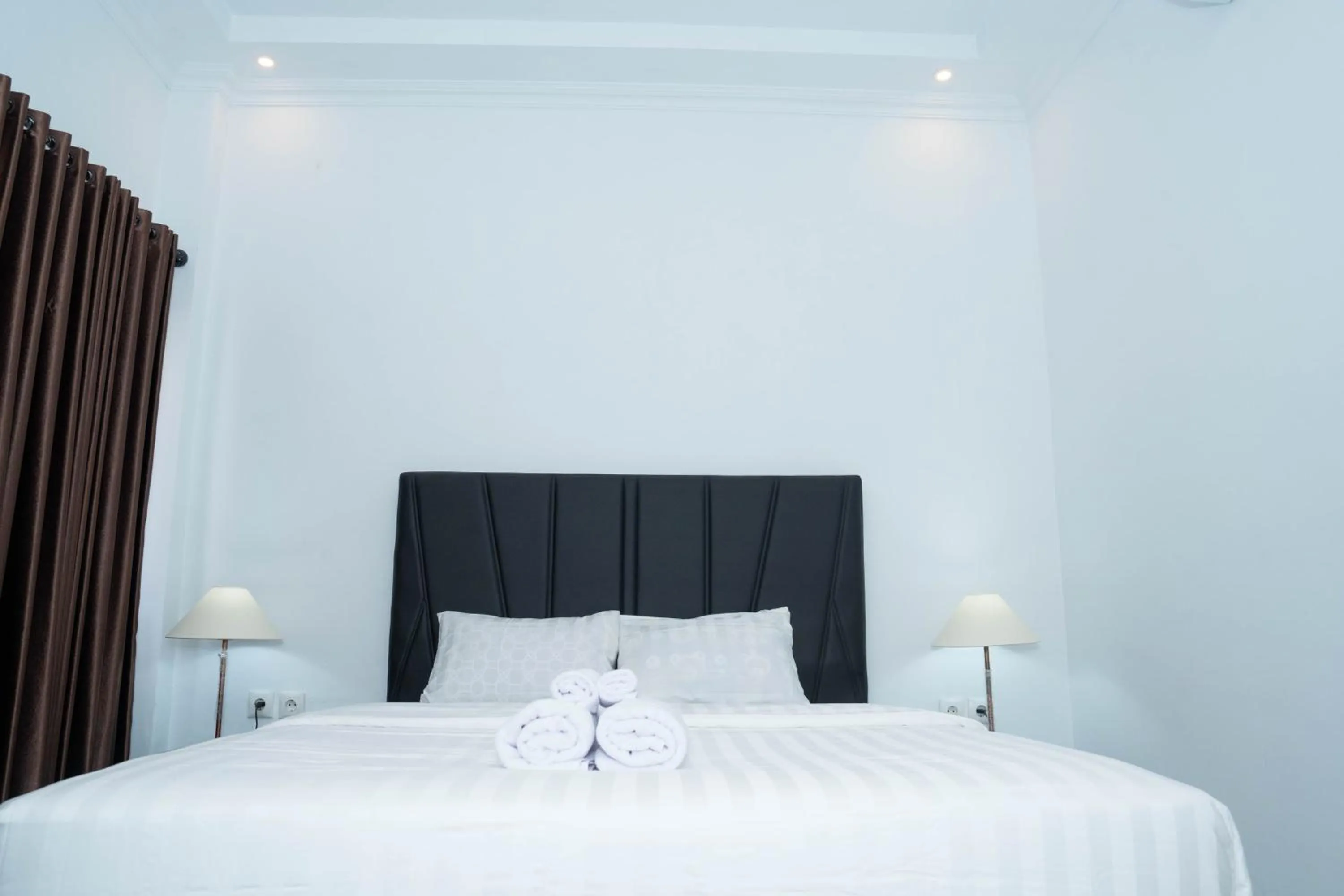 Bed in Fantasticroom Labuan Bajo