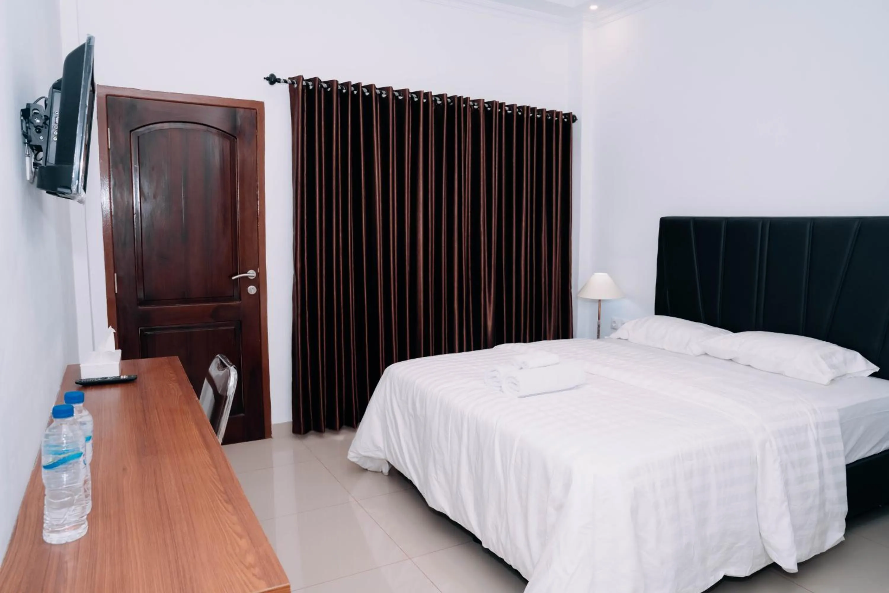 Bed in Fantasticroom Labuan Bajo
