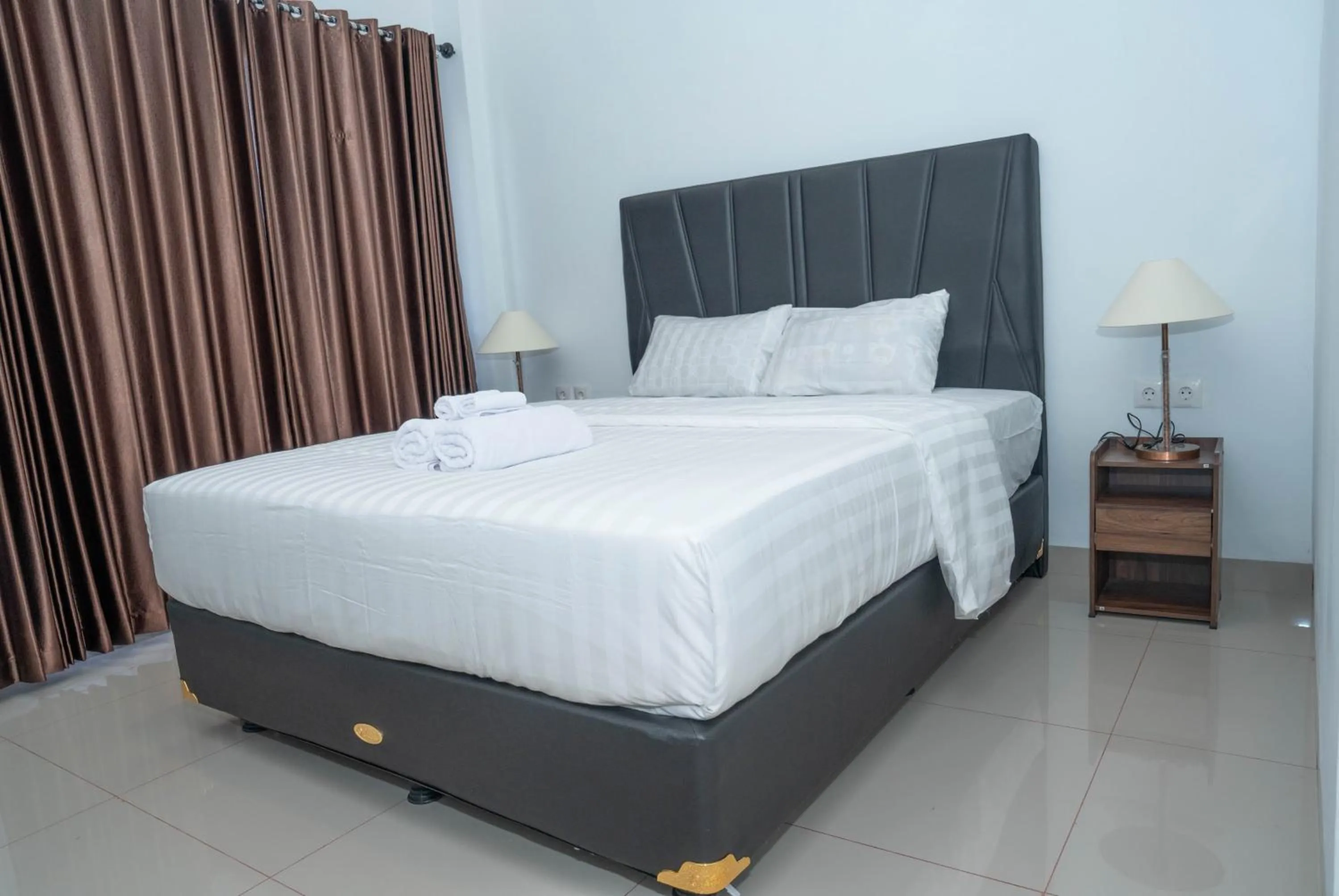 Bed in Fantasticroom Labuan Bajo