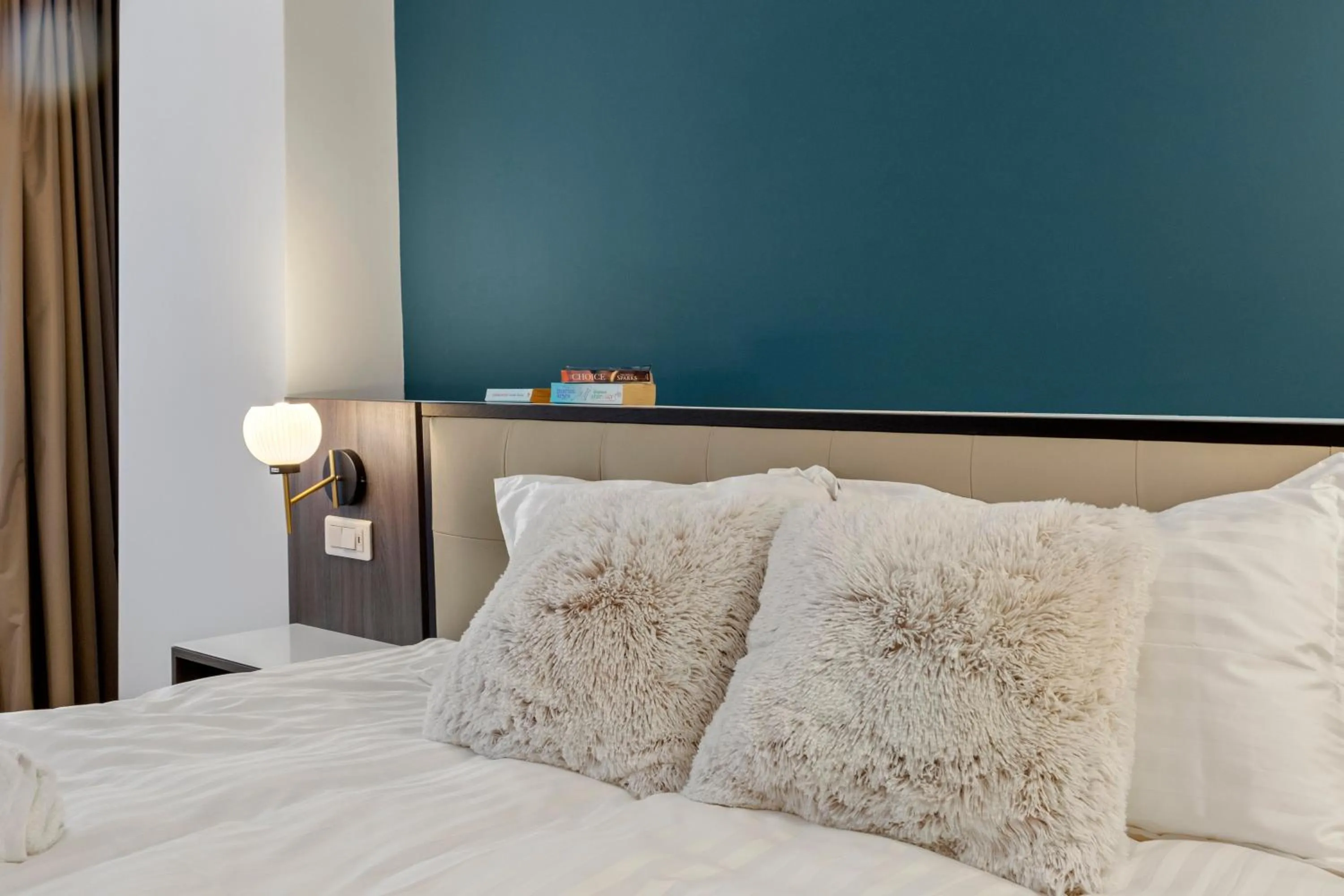 Bed in Uni88 Apart Hotel