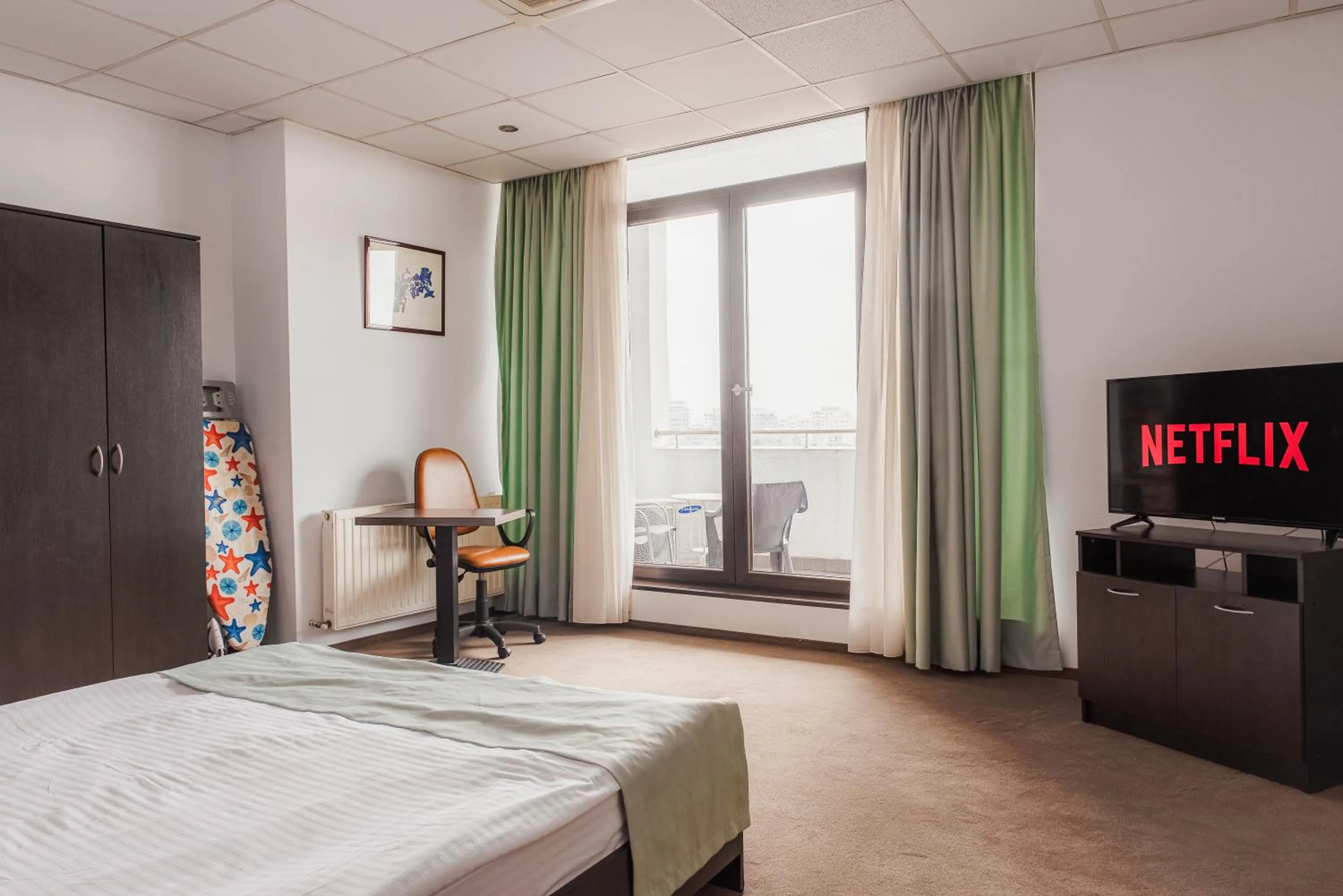 TV and multimedia, Bed in Uni88 Apart Hotel