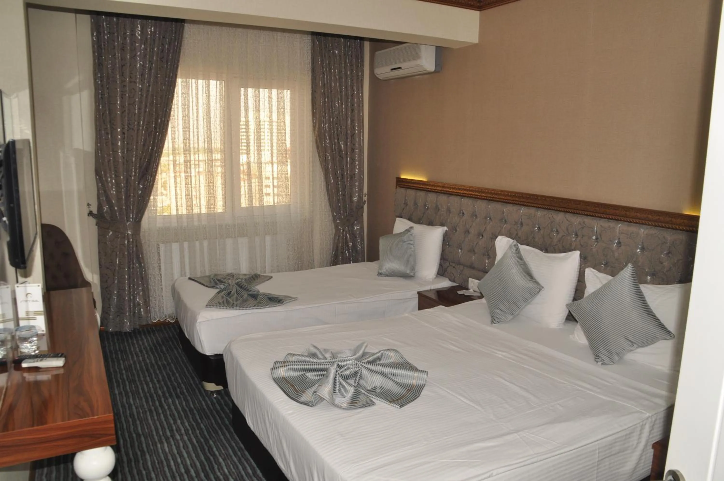 Photo of the whole room, Bed in Grand Sera Hotel