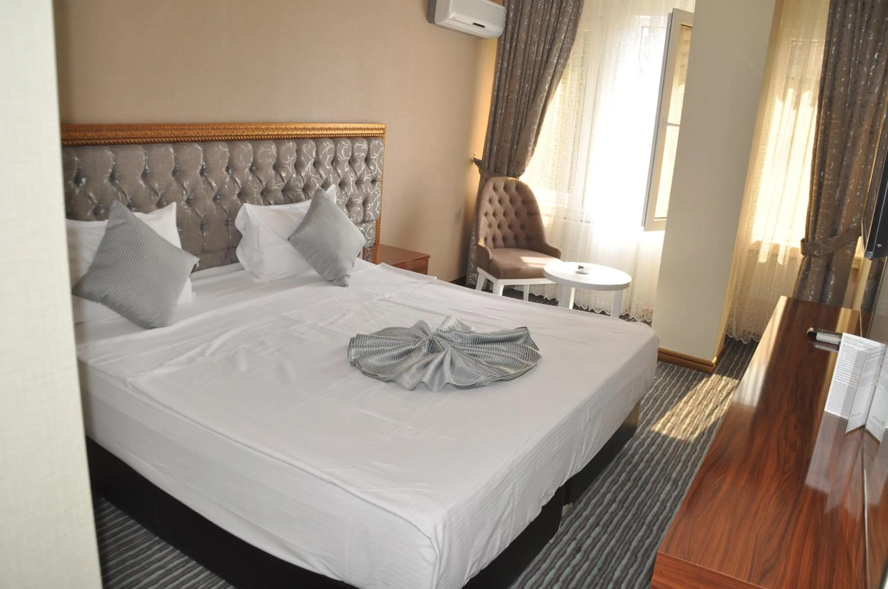 Photo of the whole room, Bed in Grand Sera Hotel