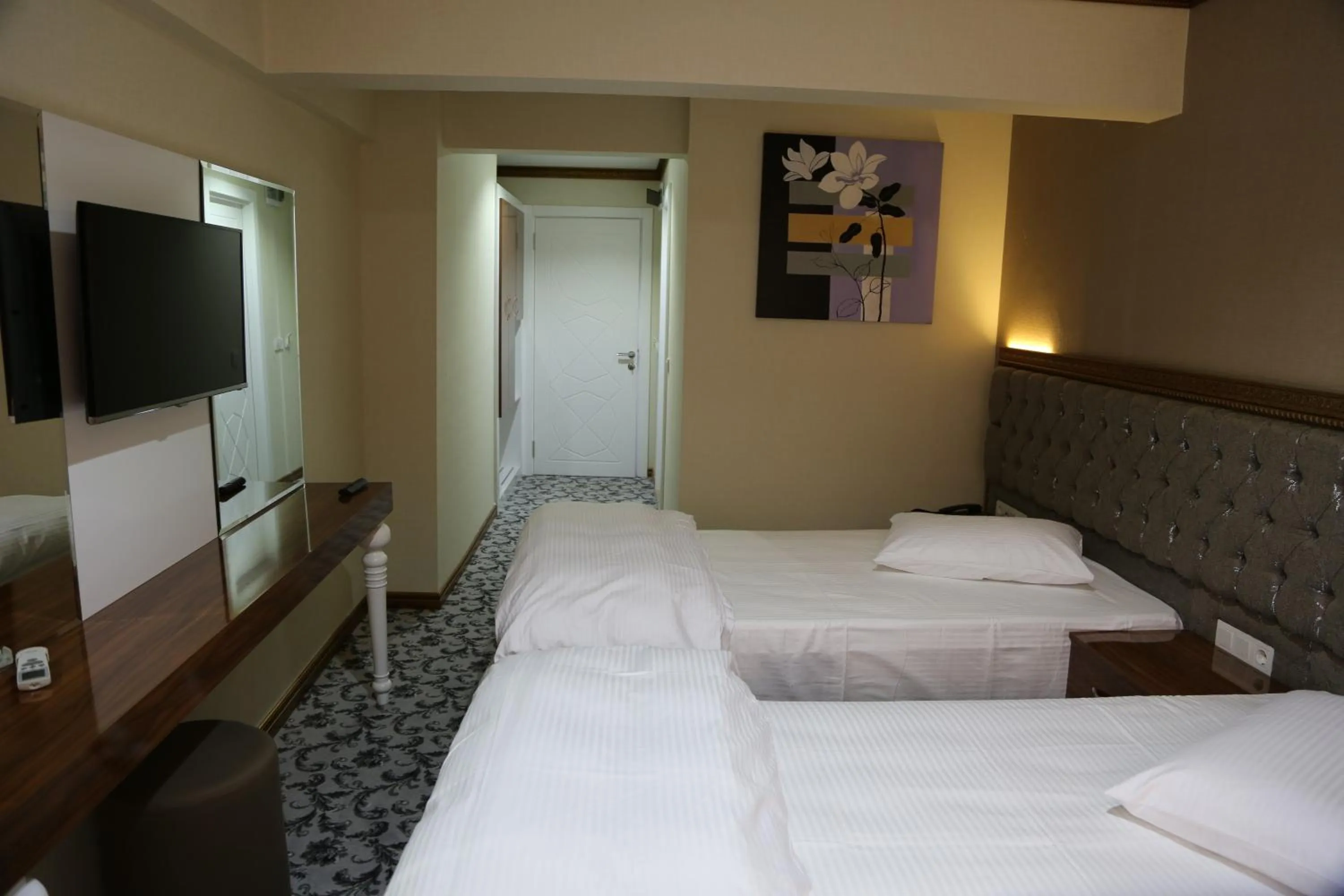 Photo of the whole room, Bed in Grand Sera Hotel
