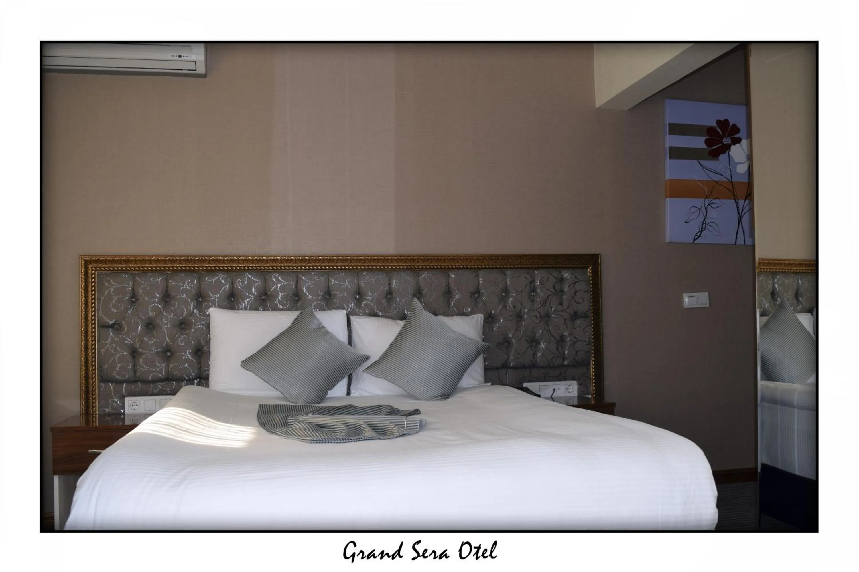 Photo of the whole room, Bed in Grand Sera Hotel