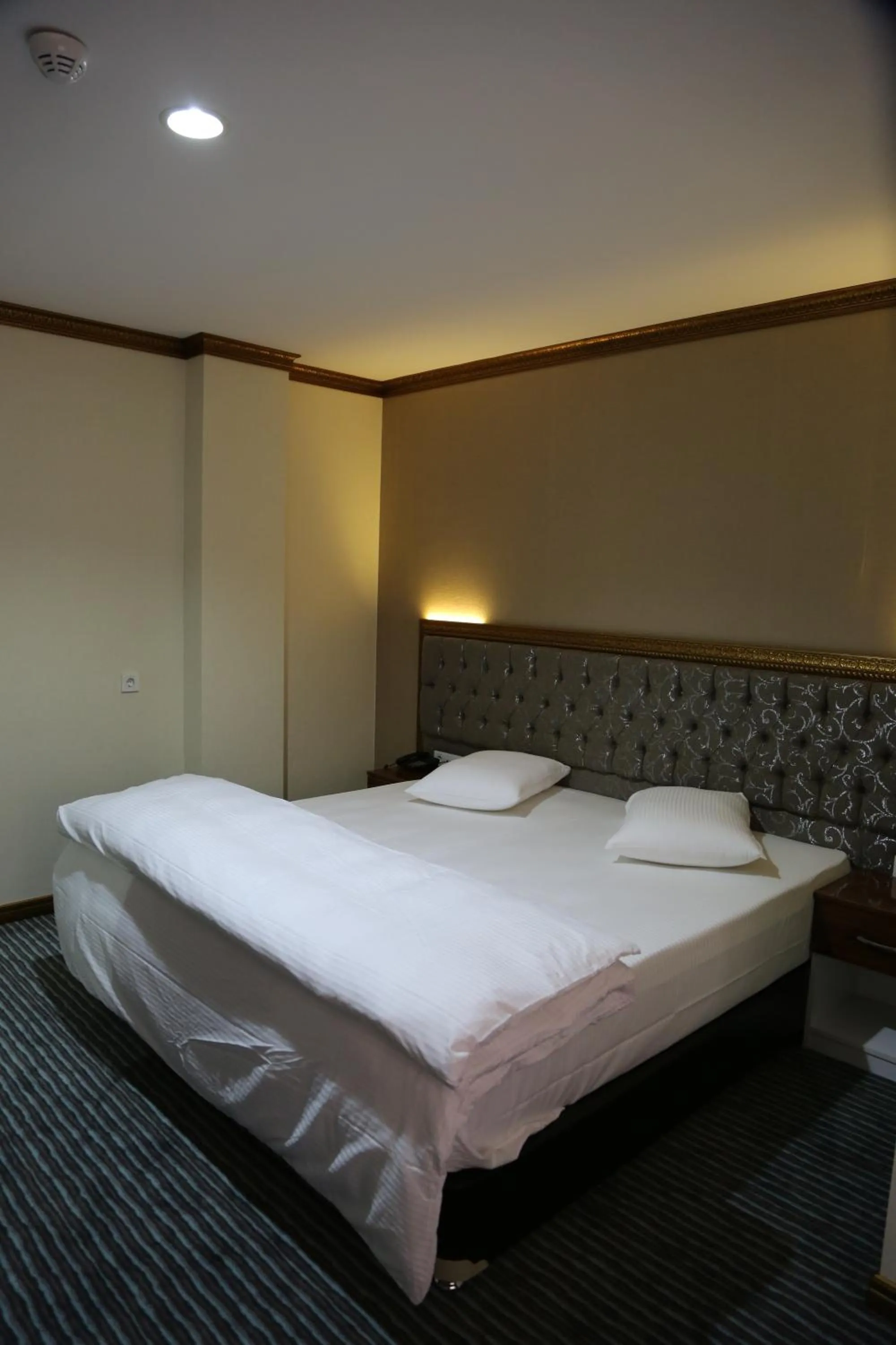 Photo of the whole room, Bed in Grand Sera Hotel