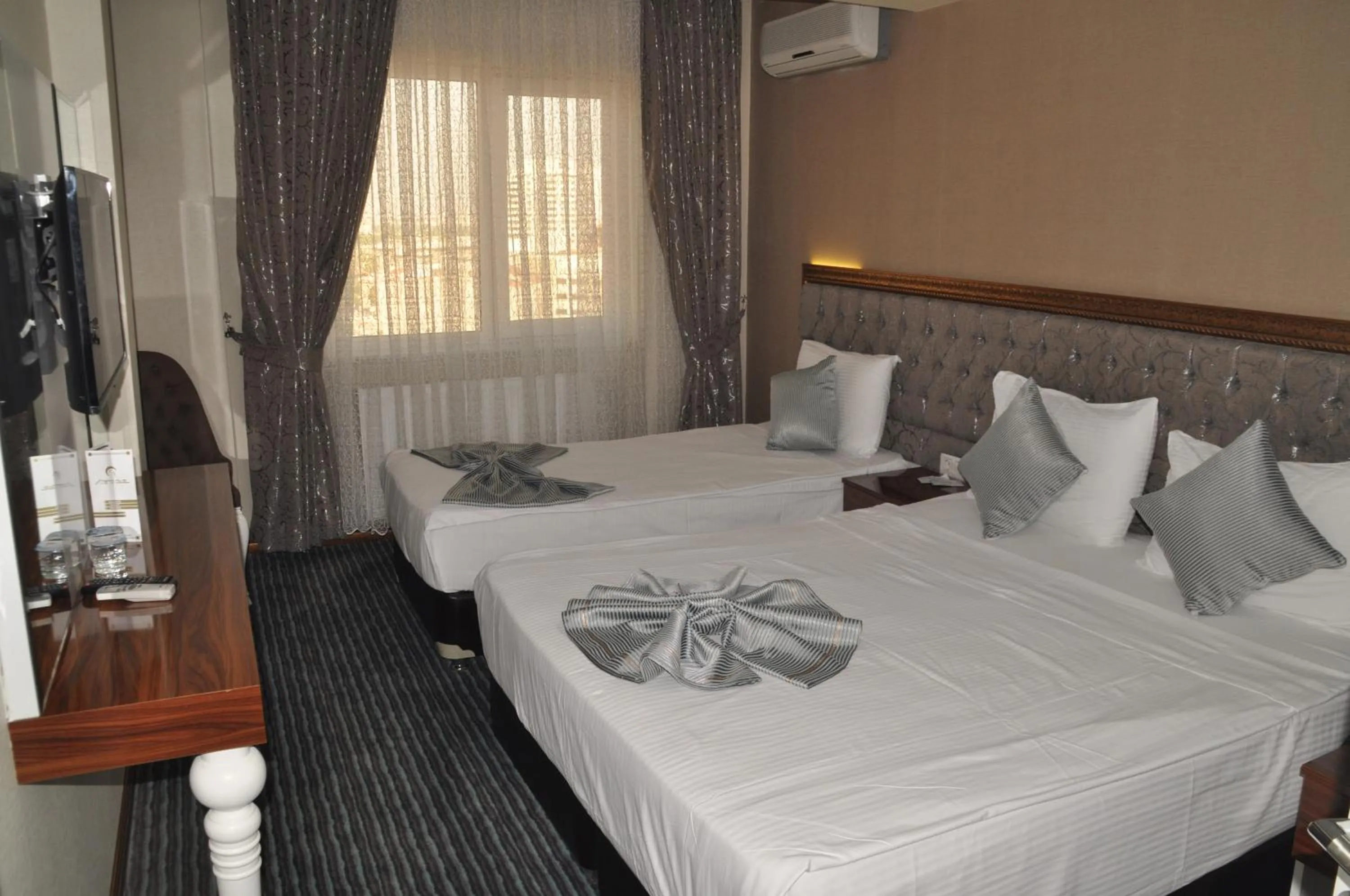 Photo of the whole room, Bed in Grand Sera Hotel