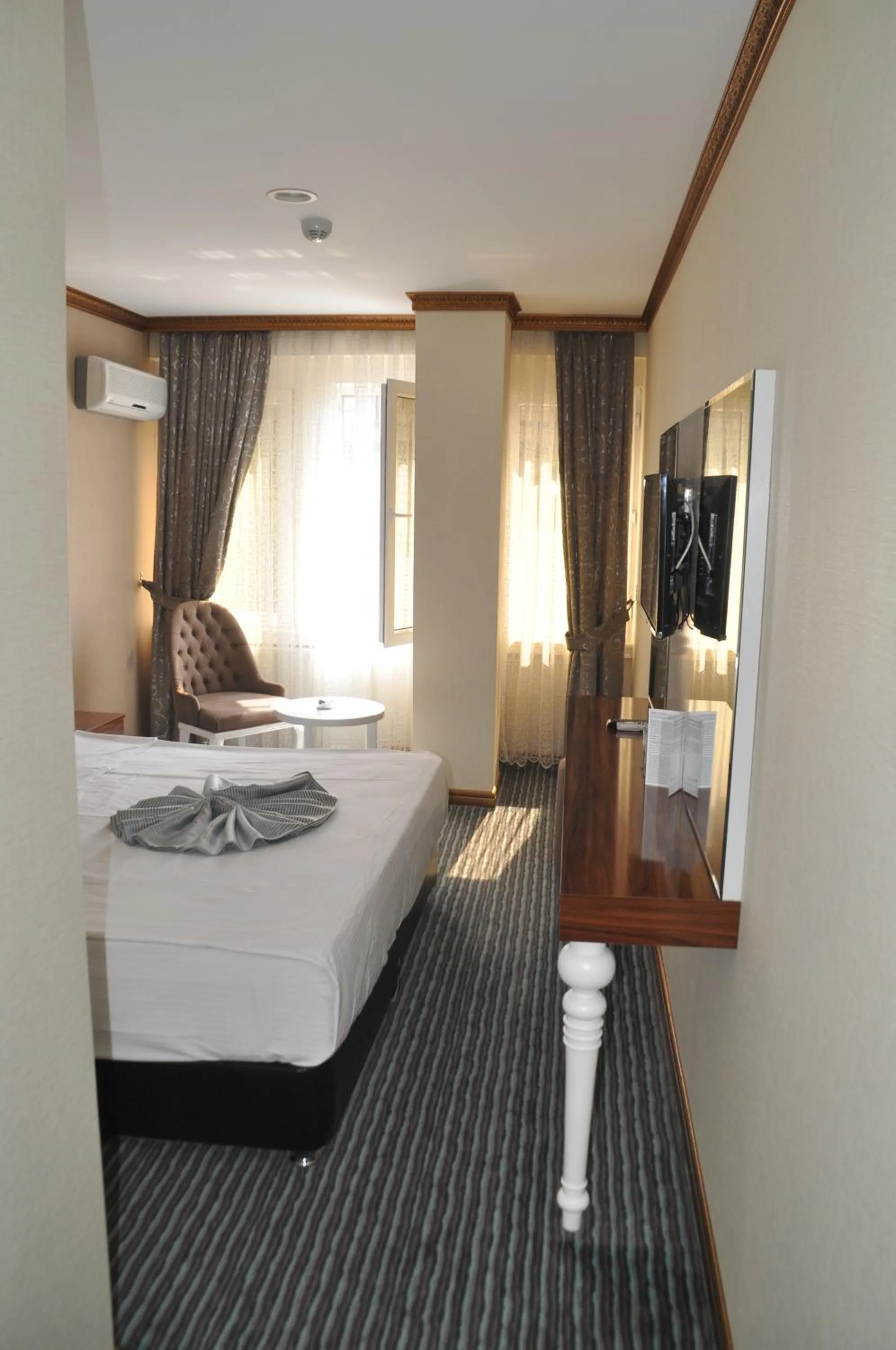 Photo of the whole room, Bed in Grand Sera Hotel