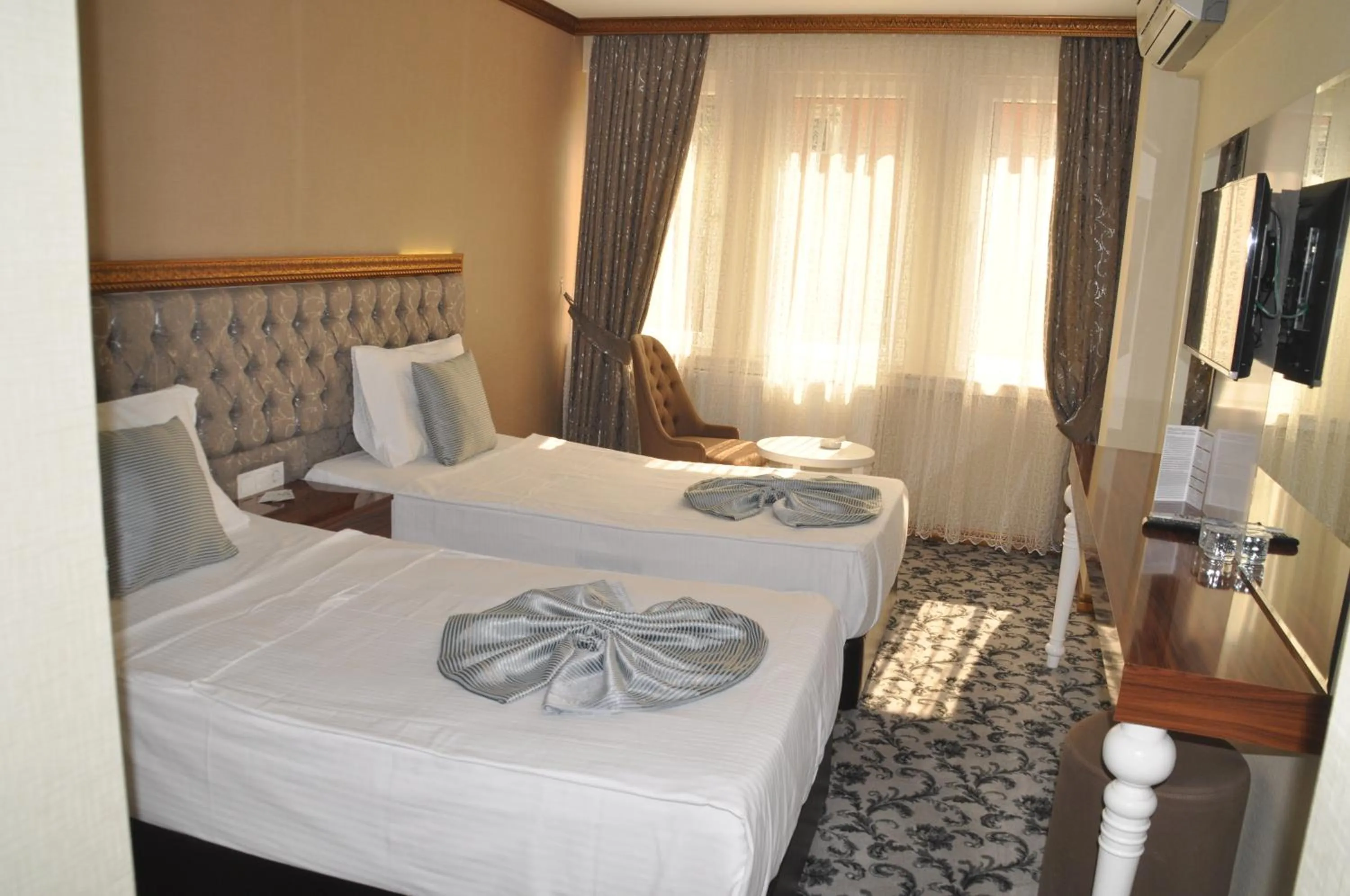 Photo of the whole room, Bed in Grand Sera Hotel