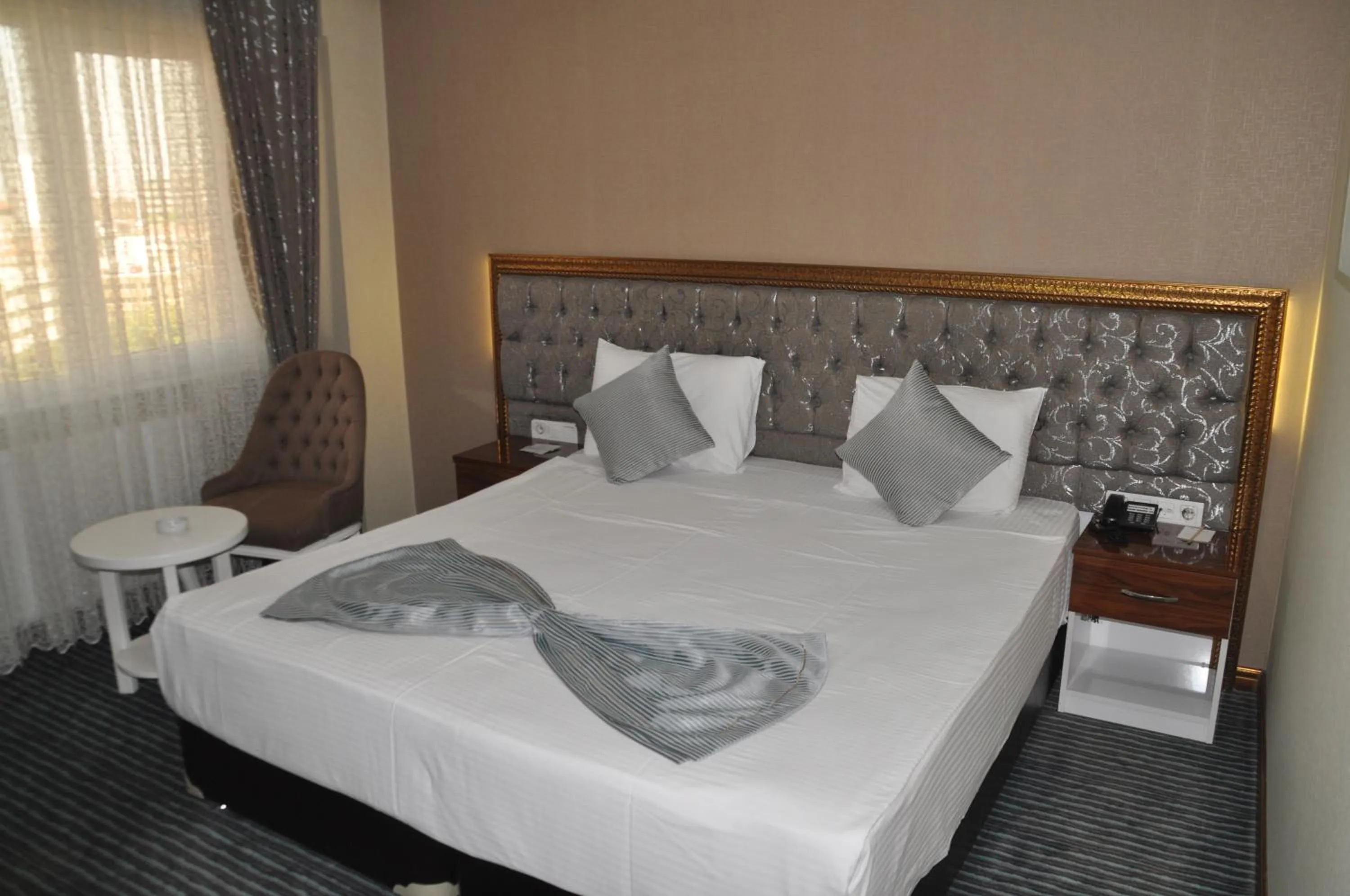 Photo of the whole room, Bed in Grand Sera Hotel