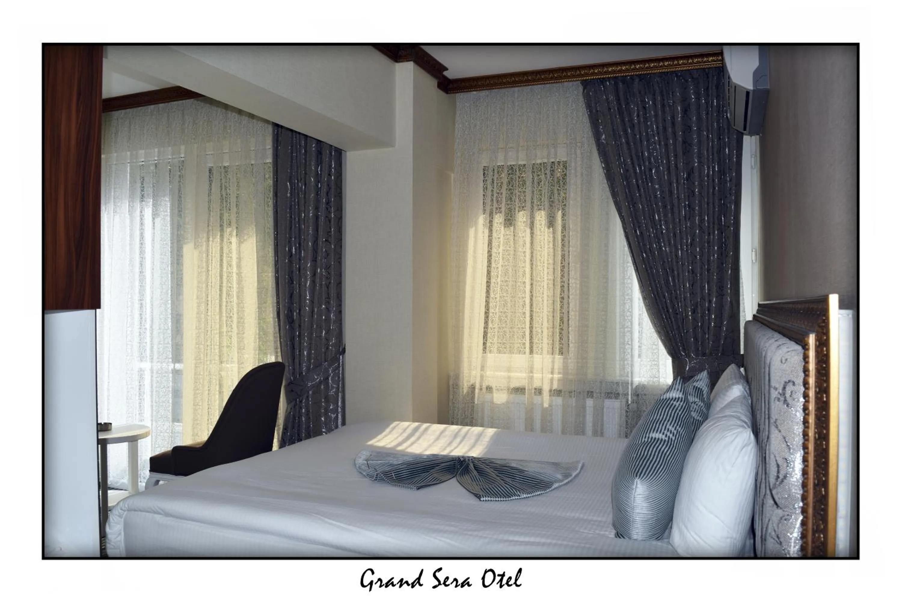 Photo of the whole room, Bed in Grand Sera Hotel
