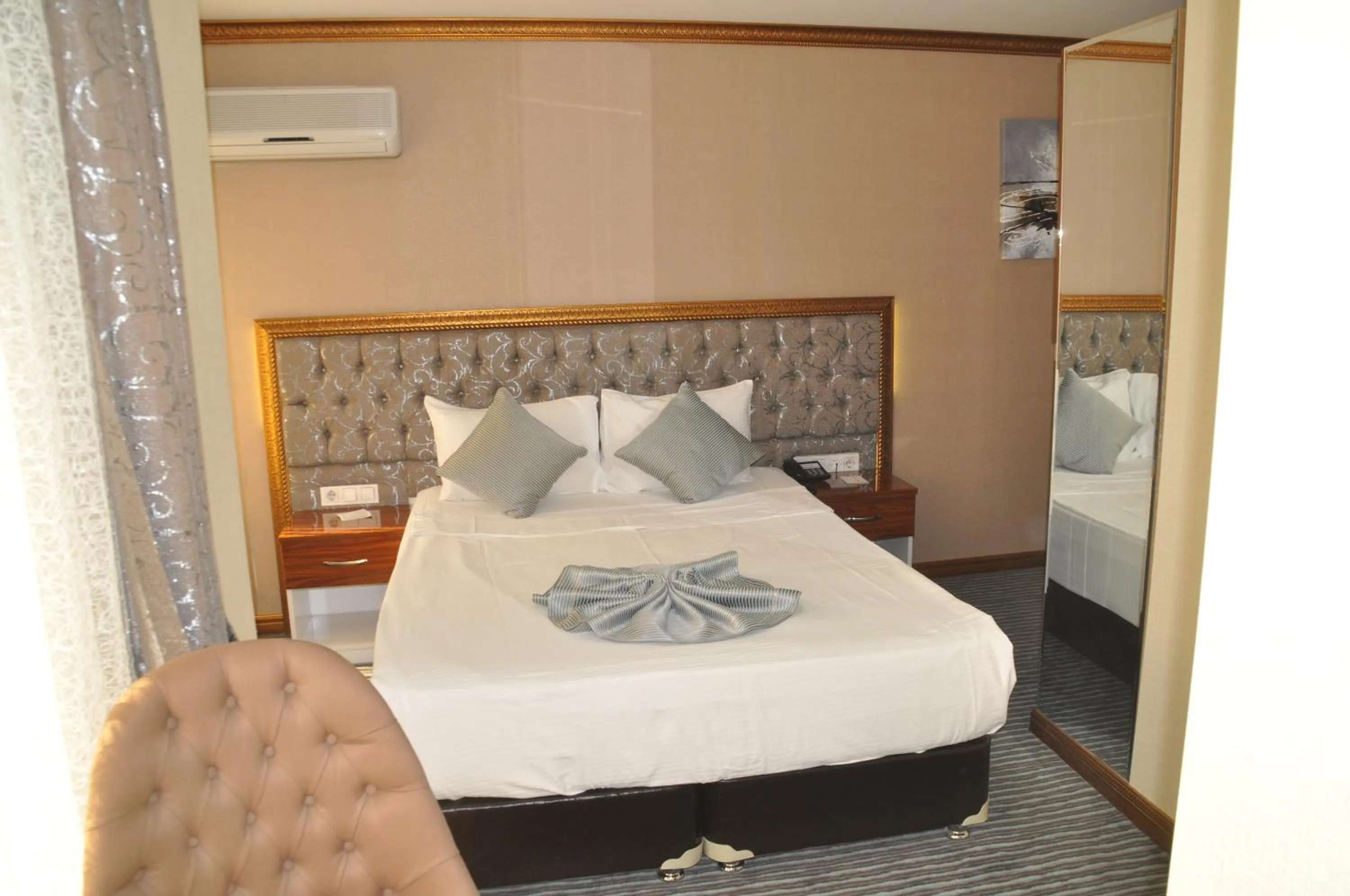 Photo of the whole room, Bed in Grand Sera Hotel
