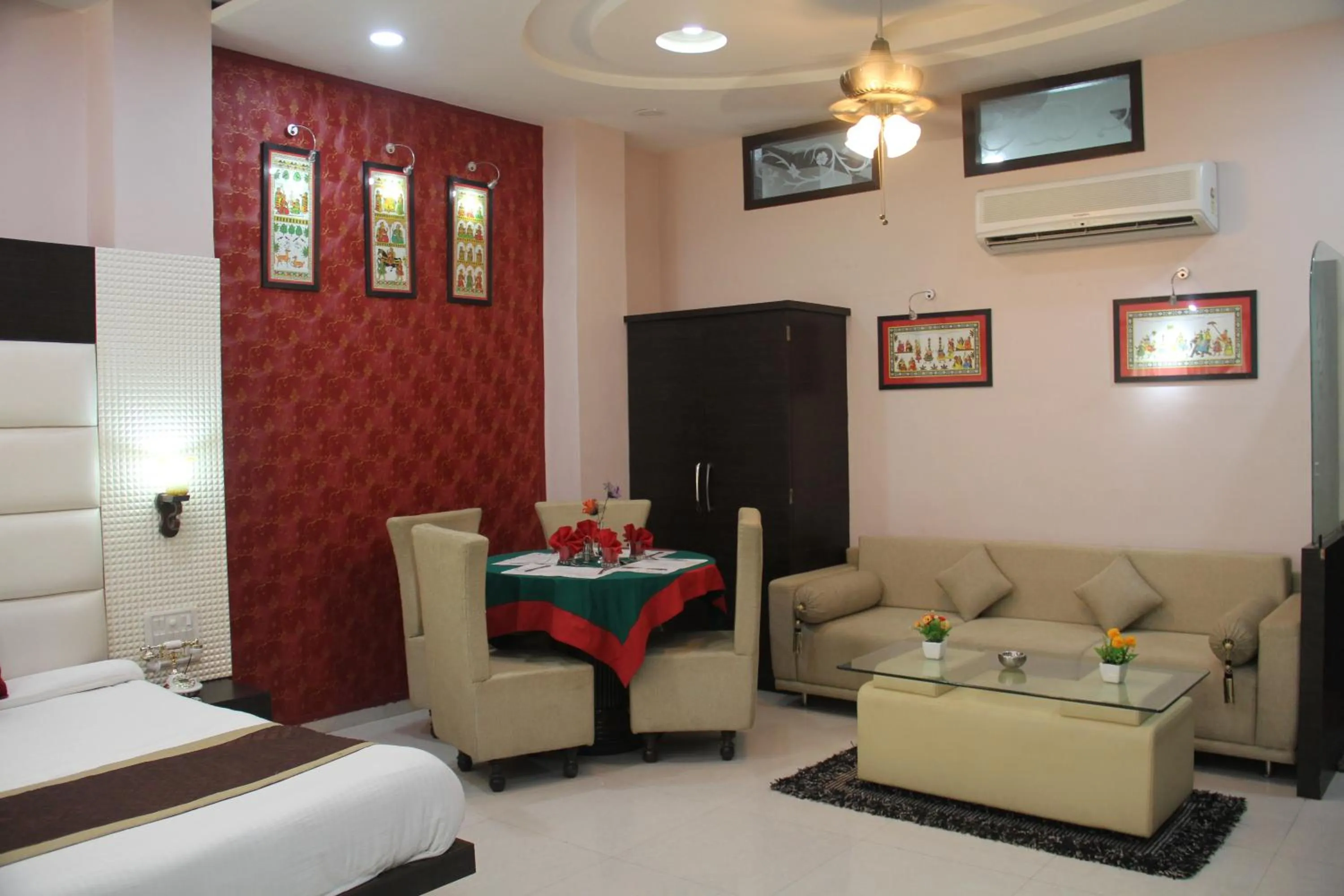 Seating area, Bed in Hotel Bhagyodaya Residency Bhilwara