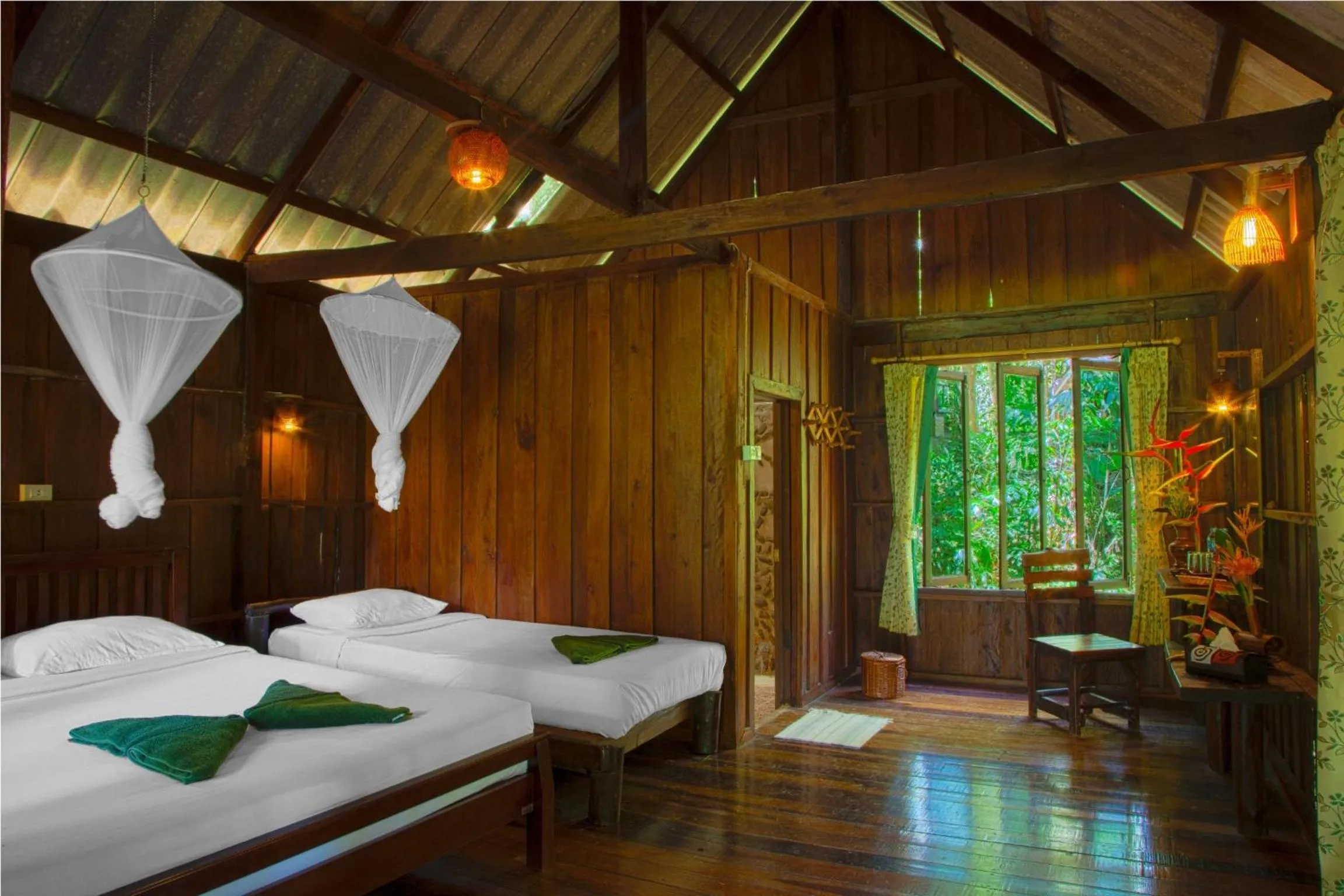 Photo of the whole room, Bed in Khao Sok Riverside Cottages
