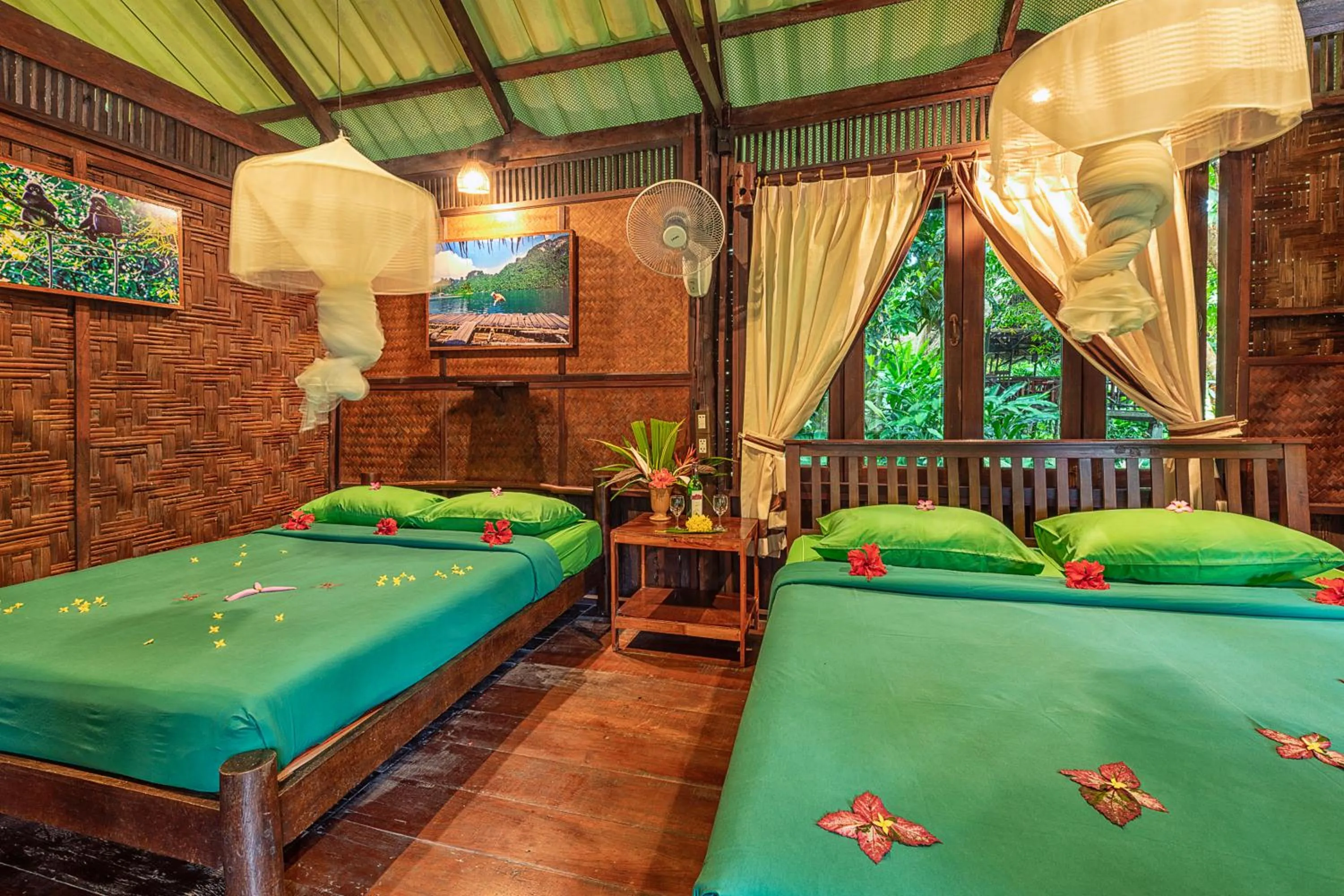 Bed in Khao Sok Riverside Cottages