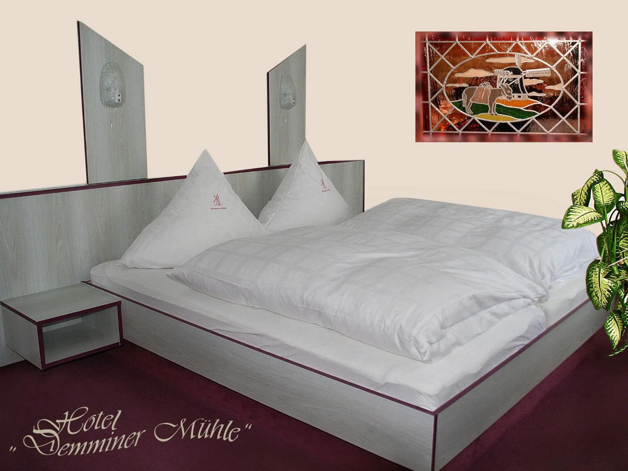 Bed in Hotel Demminer Mühle