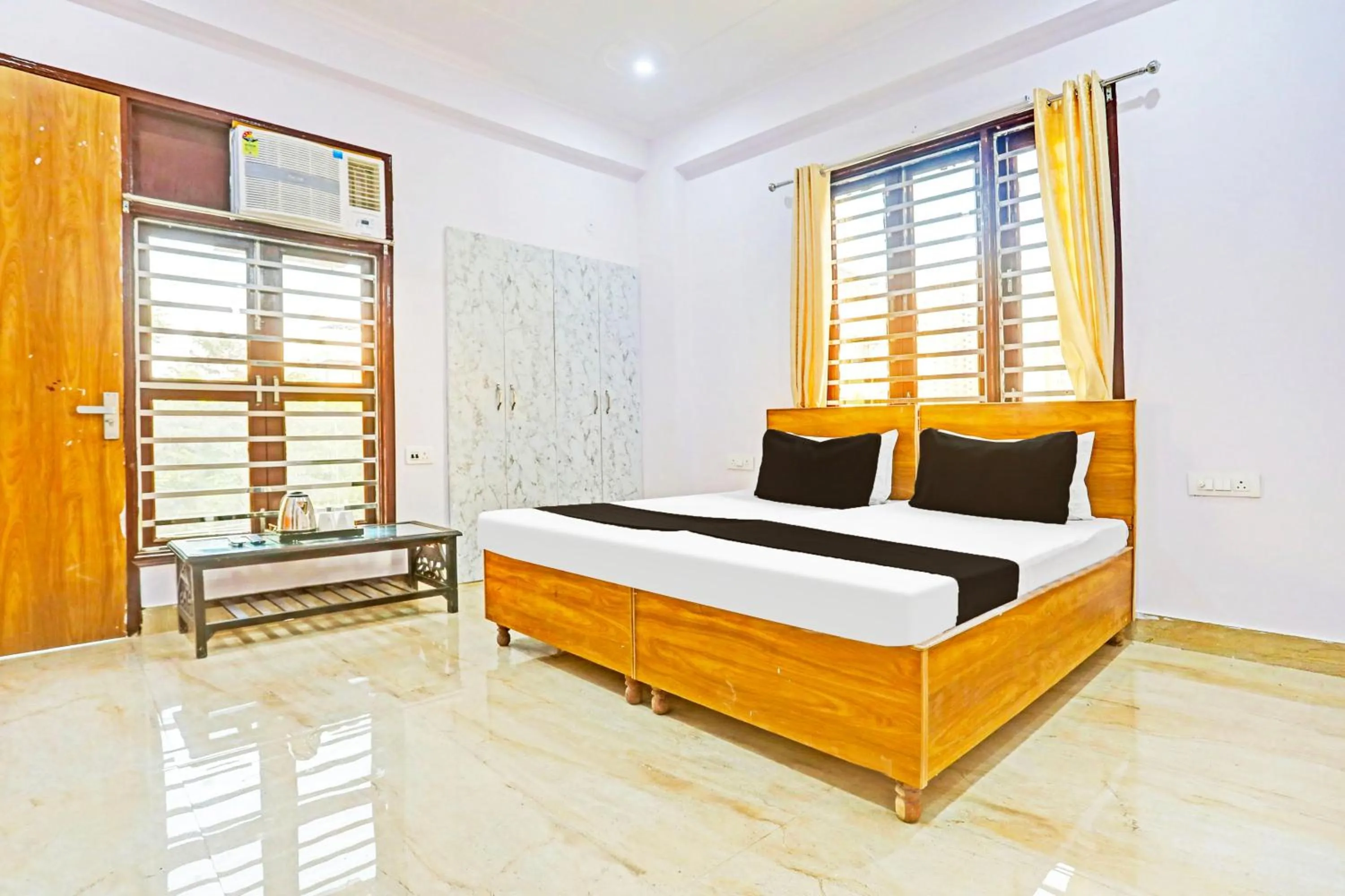 Bedroom in Hotel O High Sky Residency