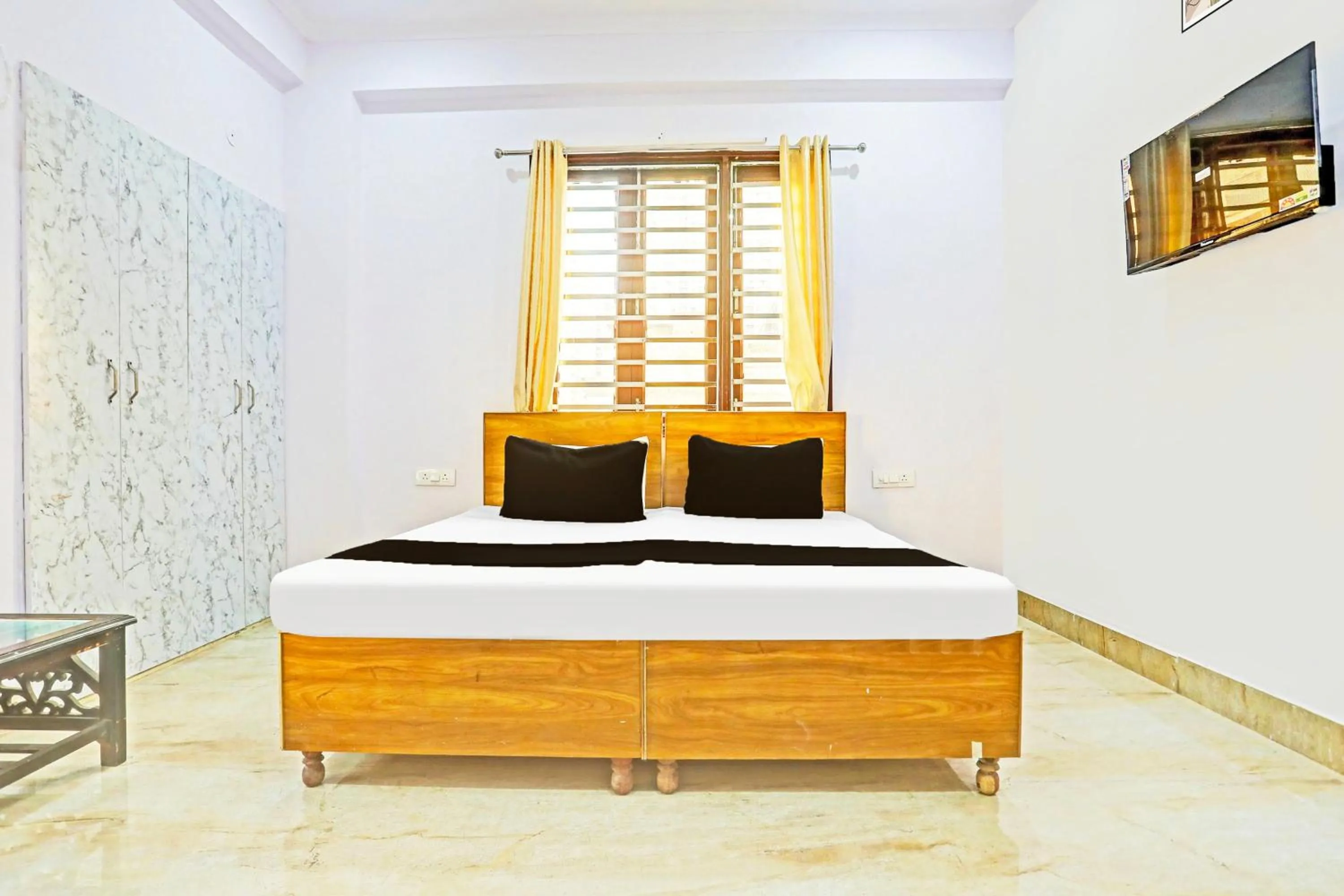 Bedroom in Hotel O High Sky Residency