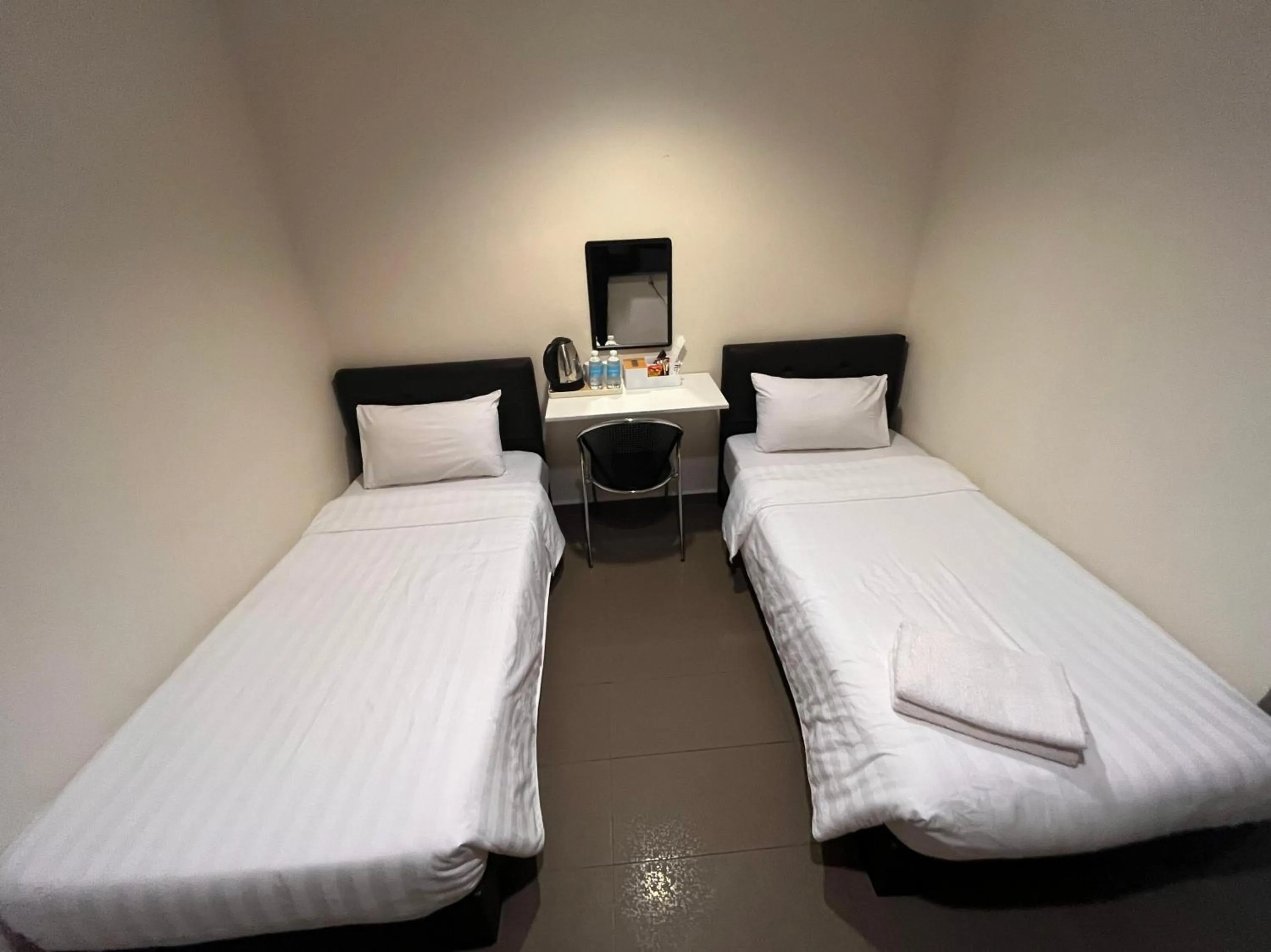 Bedroom in Hotel O Jb Sojourn