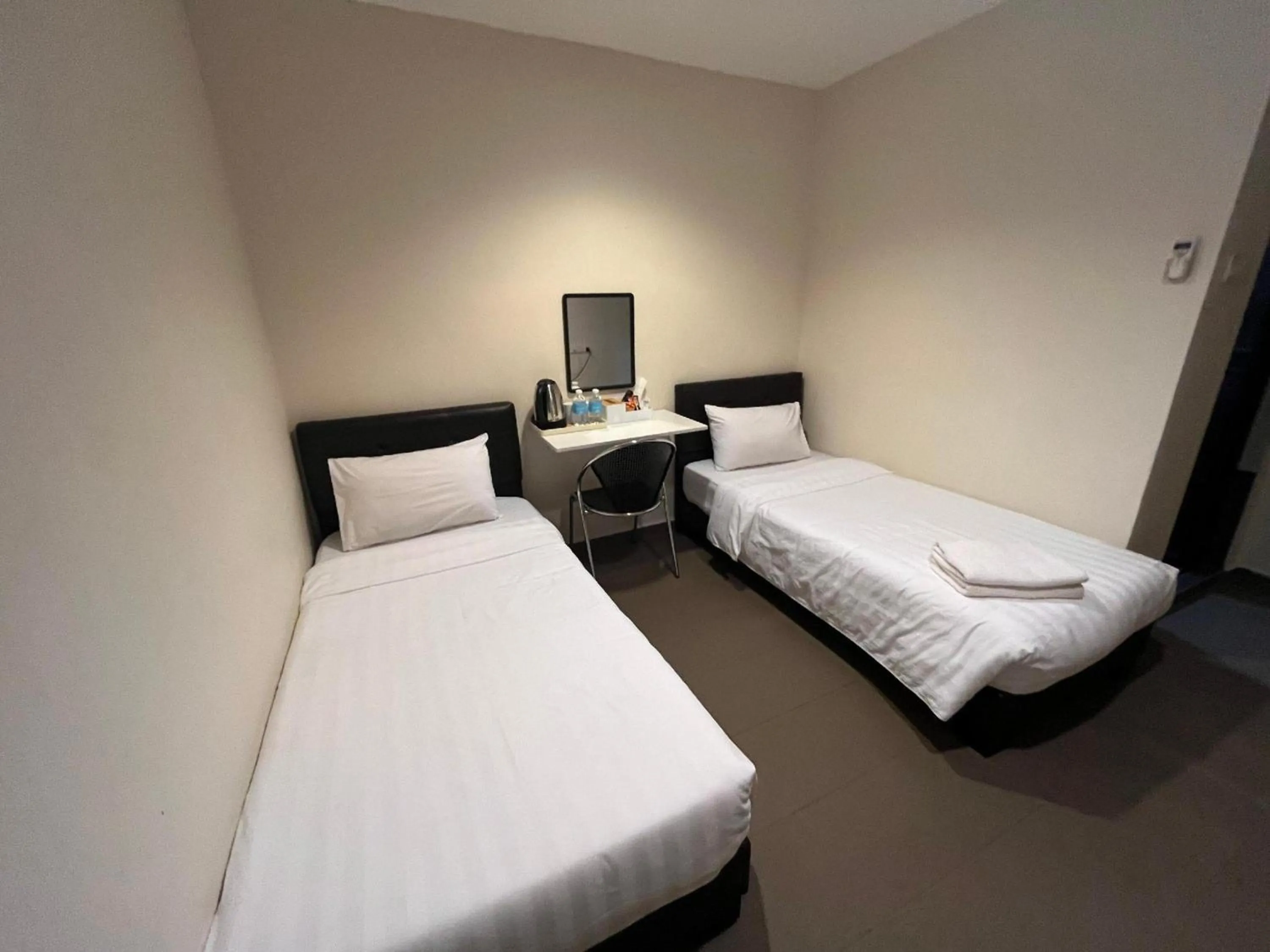 Bedroom in Hotel O Jb Sojourn