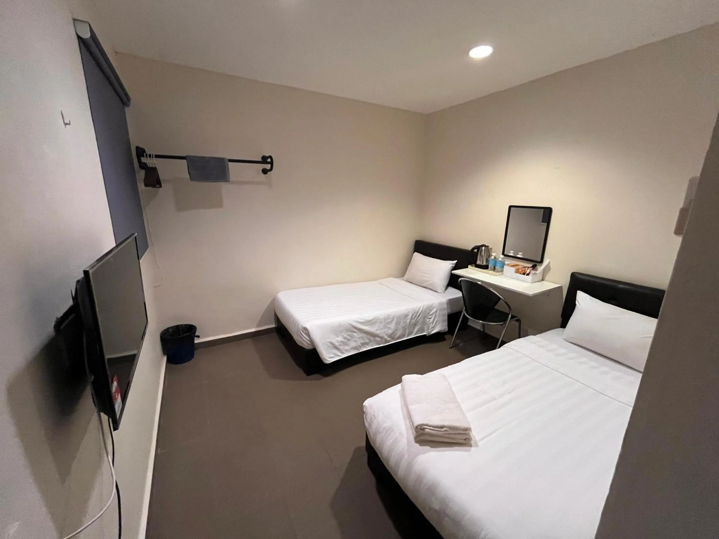 Bedroom in Hotel O Jb Sojourn