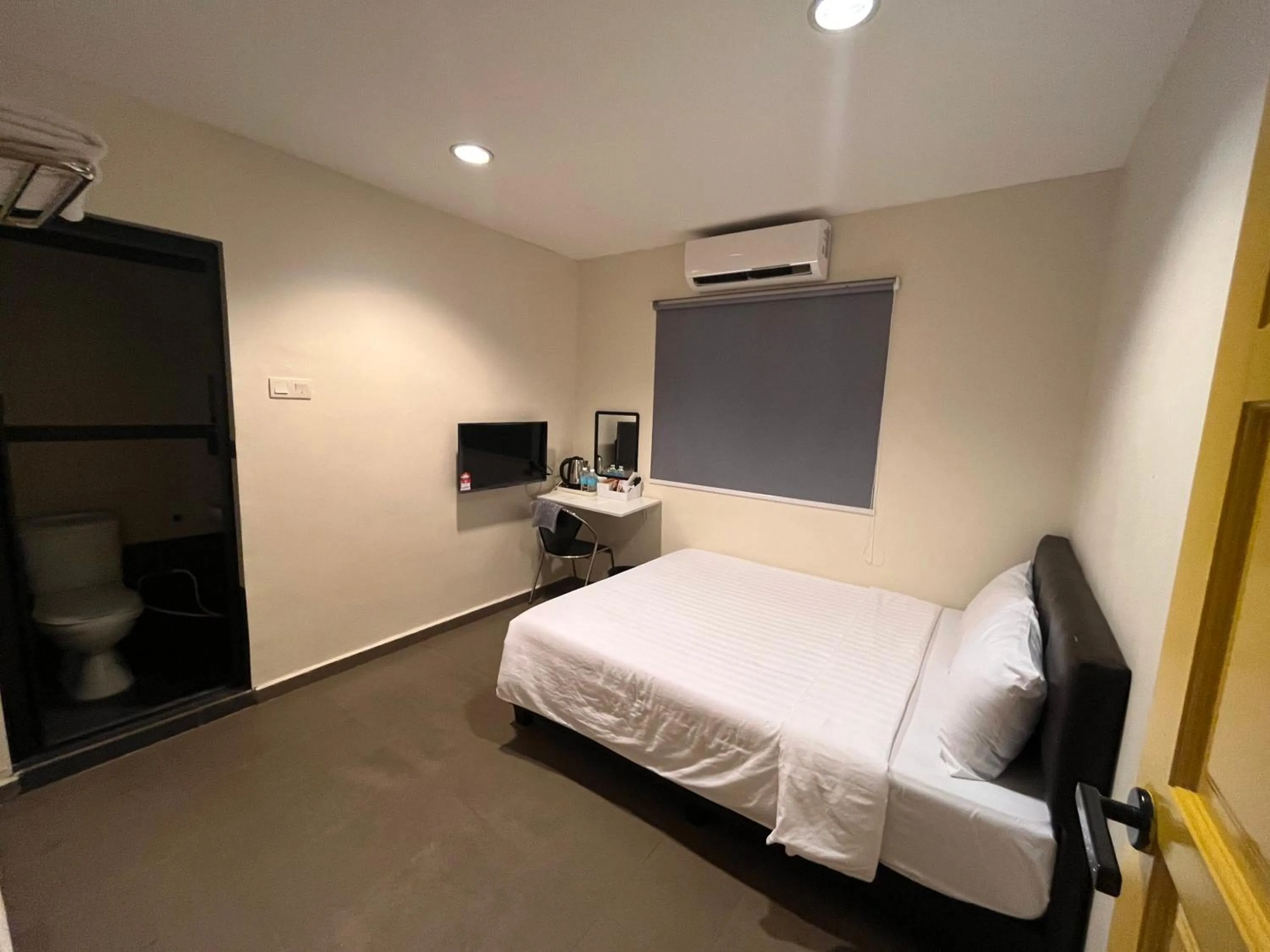 Bedroom in Hotel O Jb Sojourn