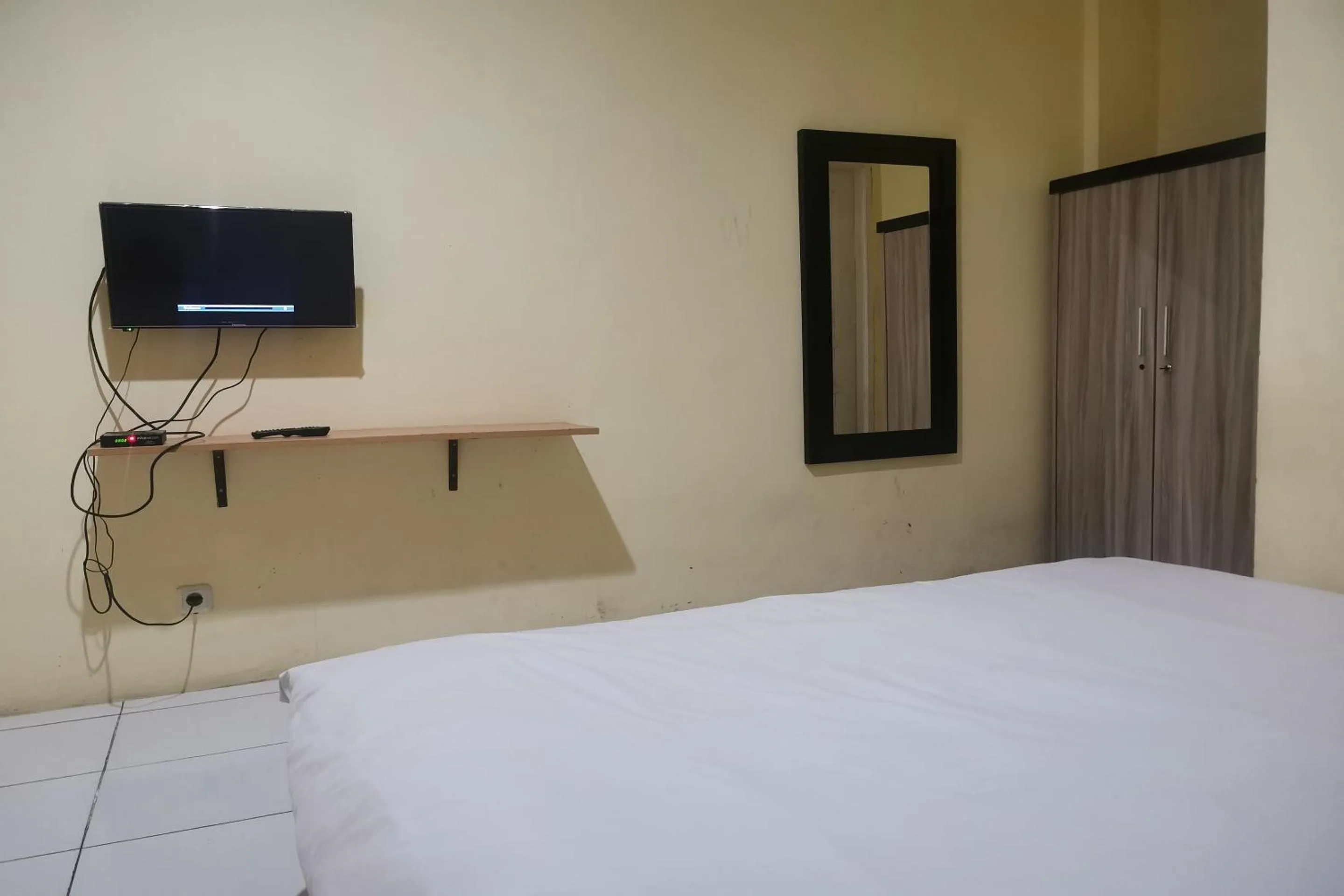 Bedroom, Bed in Hotel O Rama Homestay