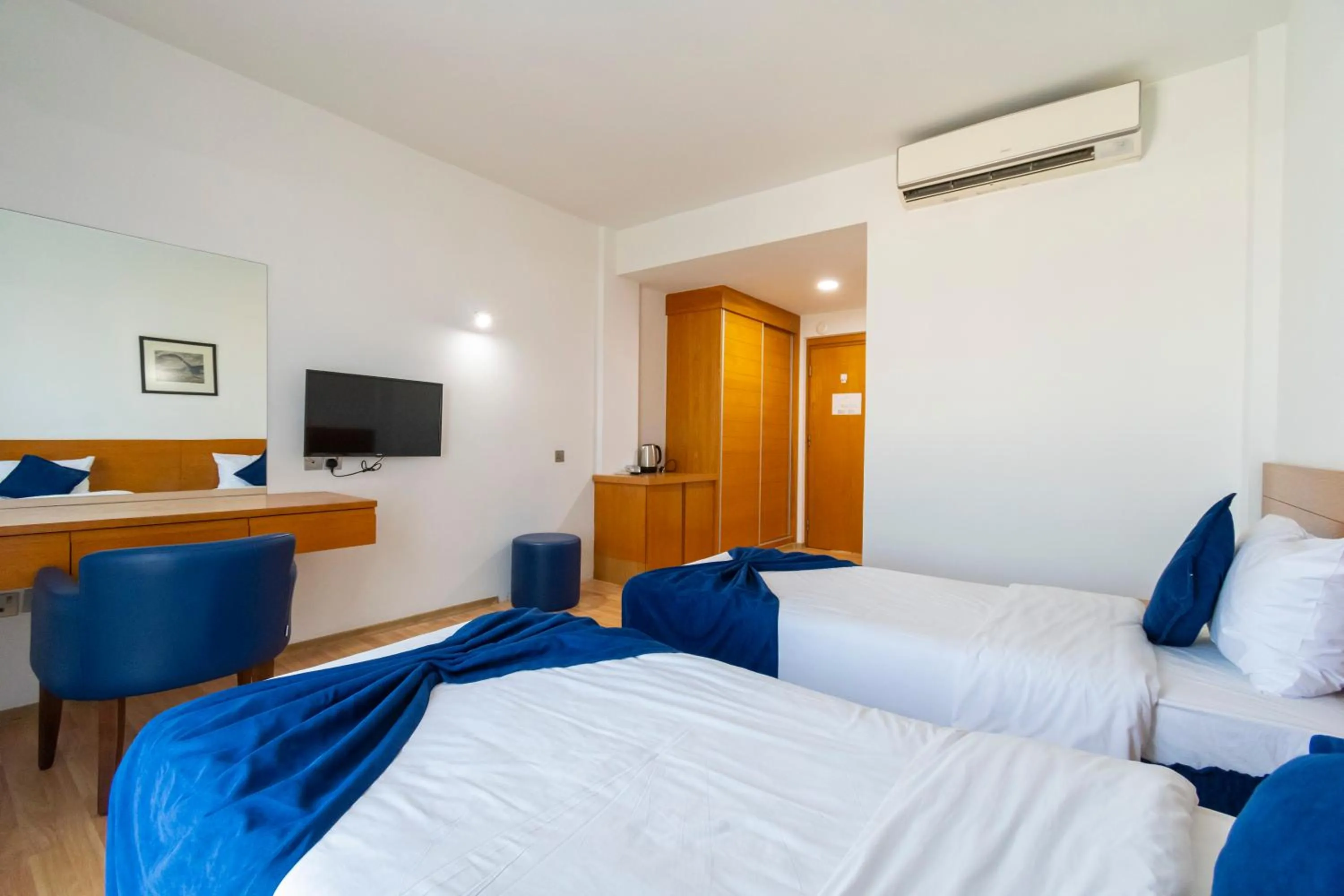 Bed in Bellapais Oasis Hotel