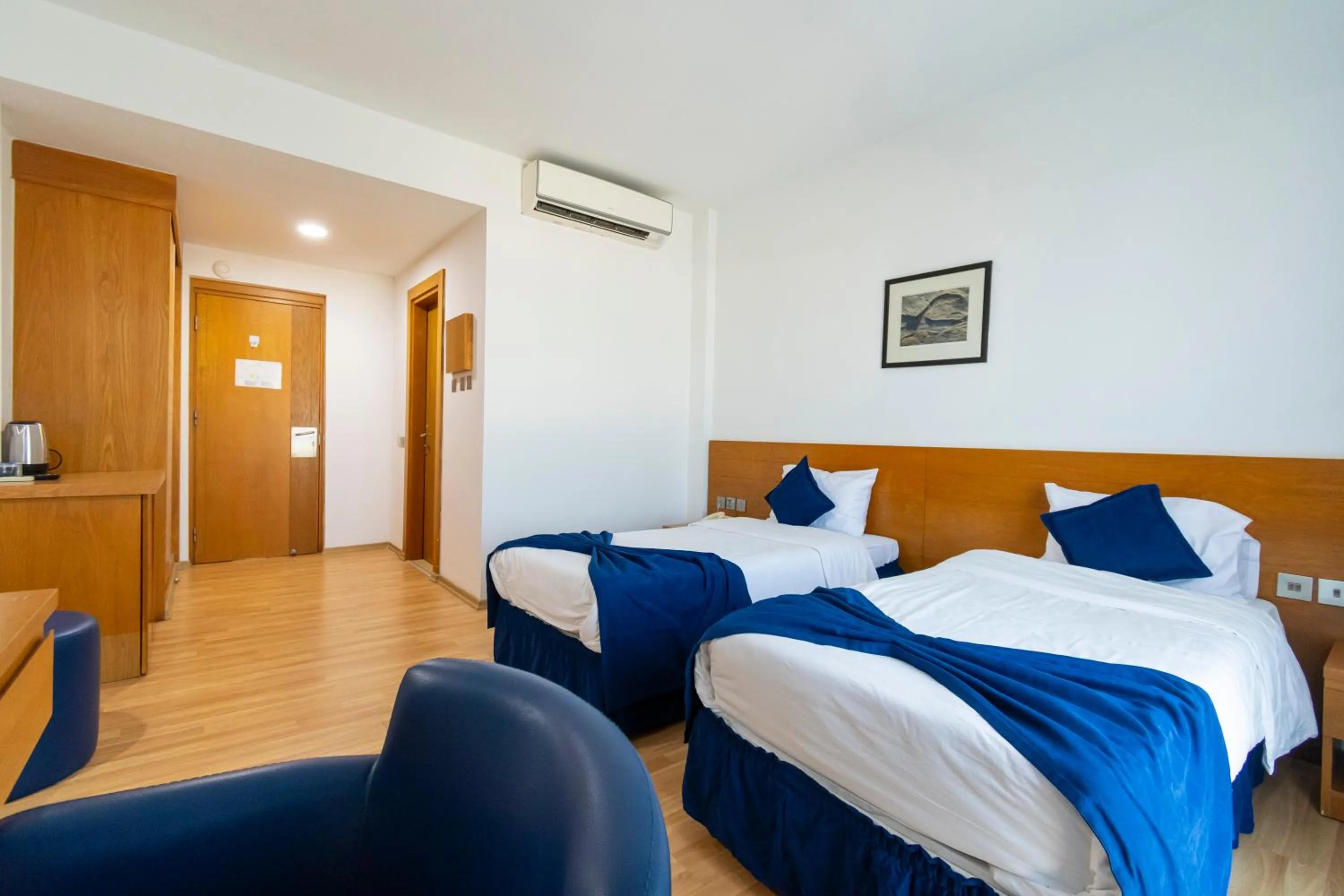 Bed in Bellapais Oasis Hotel