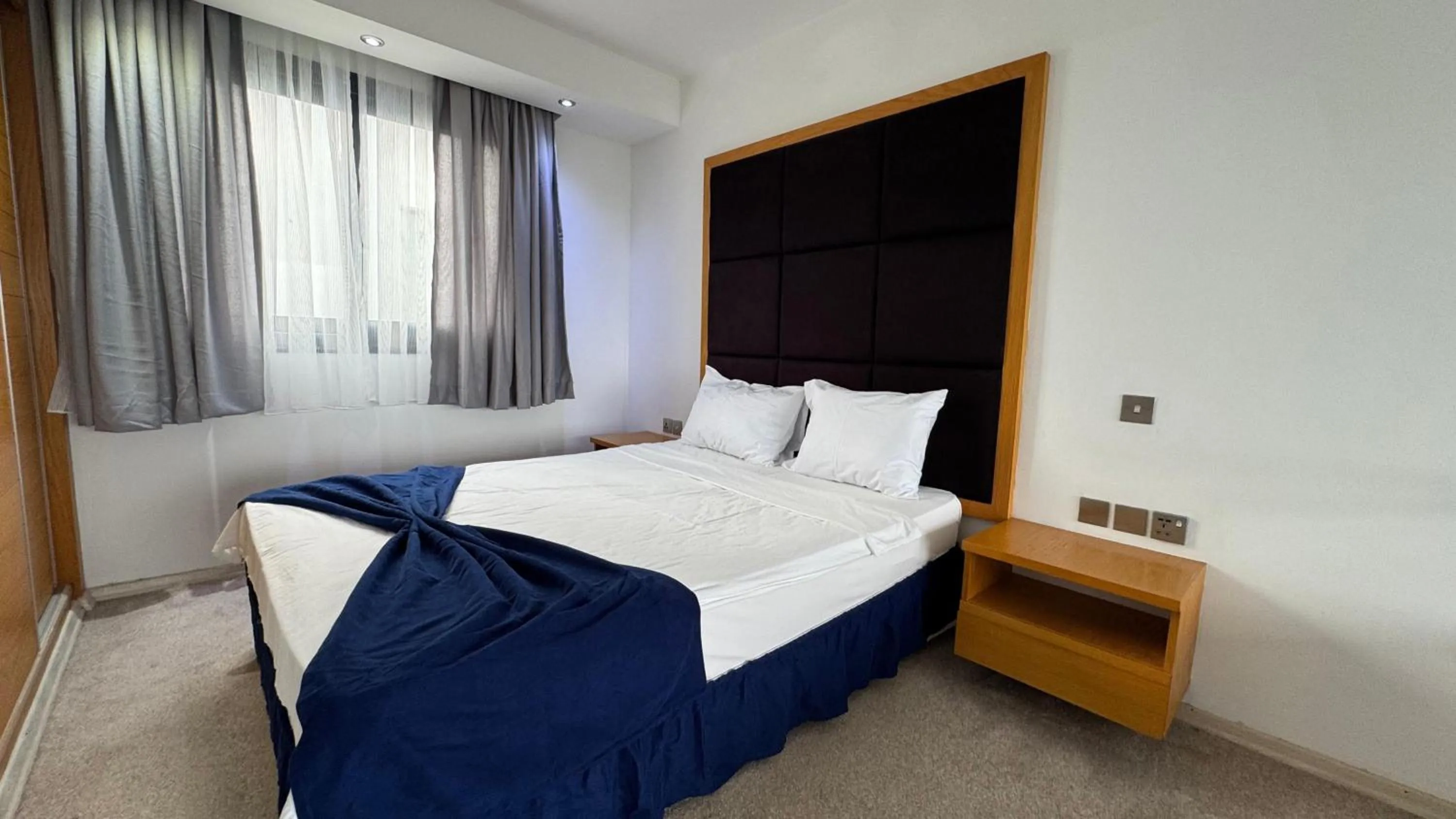 Bed in Bellapais Oasis Hotel