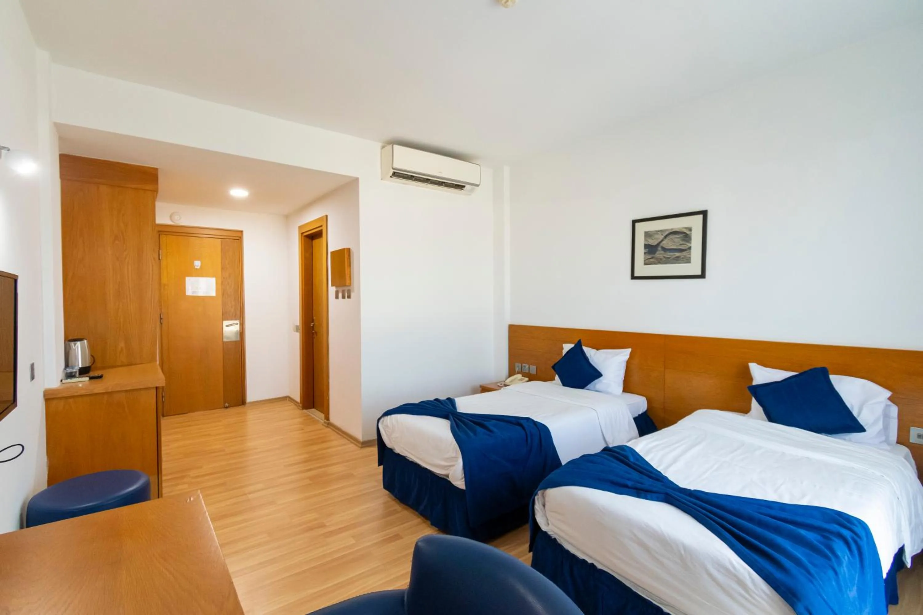 Bed in Bellapais Oasis Hotel