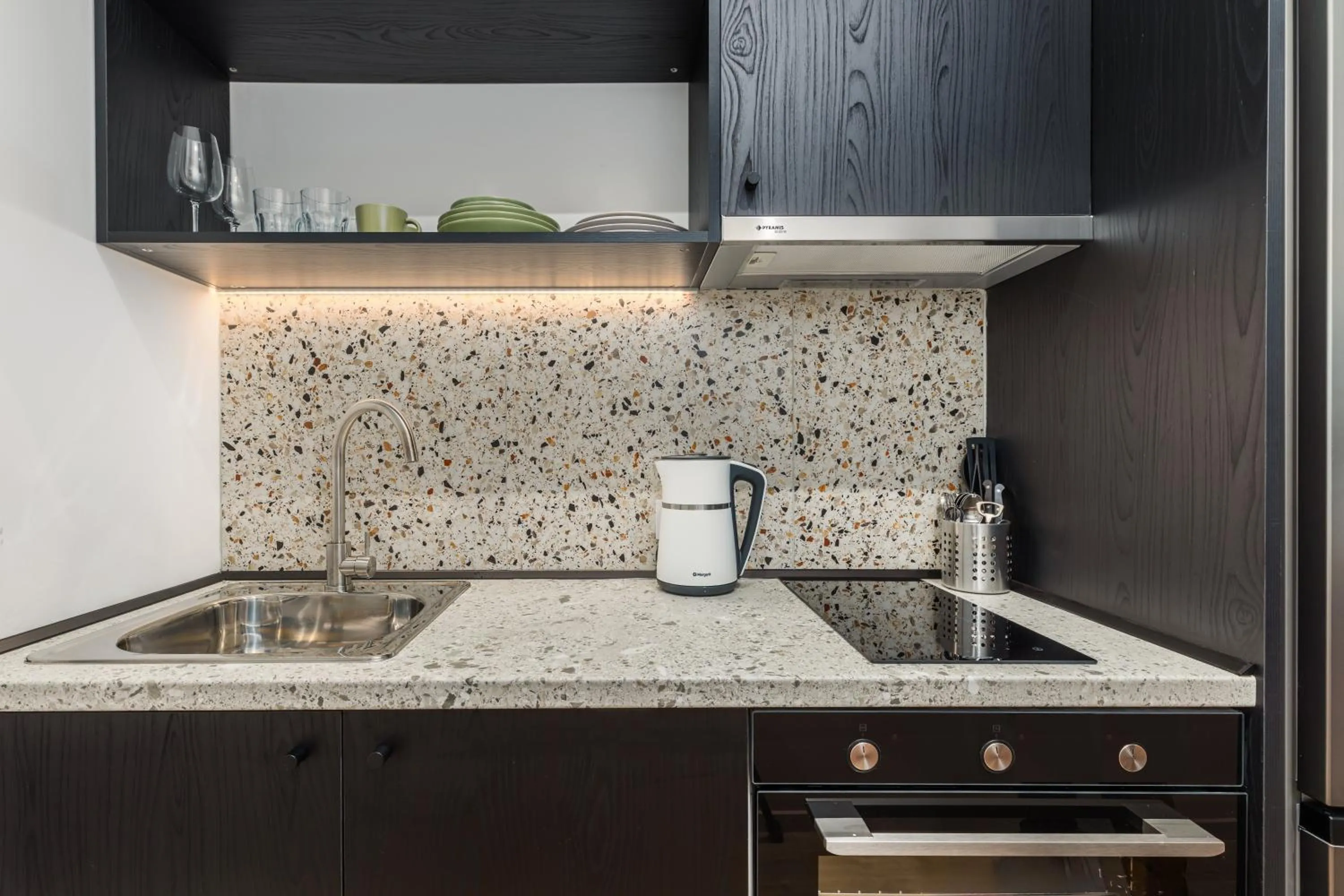 Kitchen or kitchenette in Soho Residence by halu!