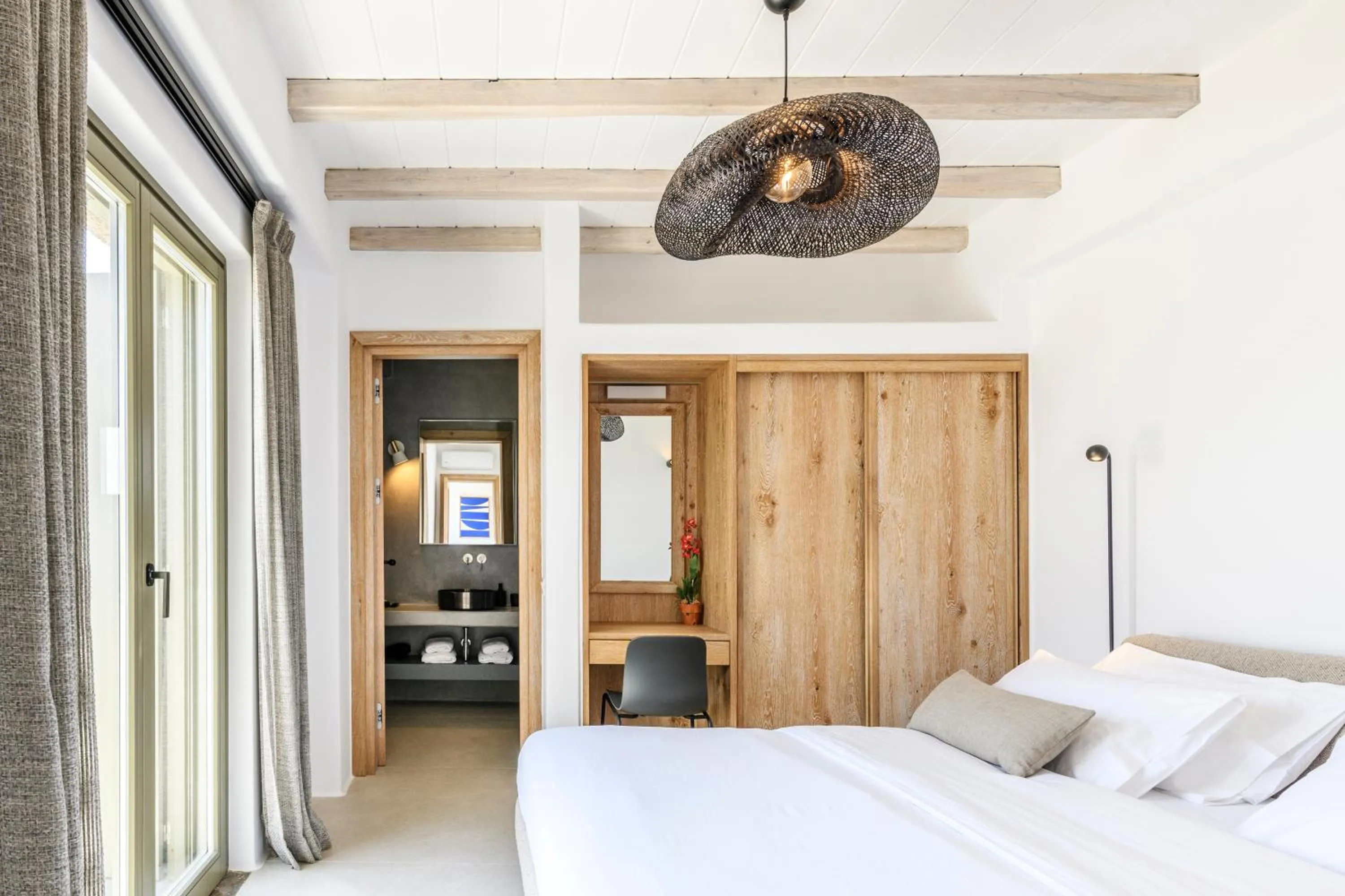 Bed in Nasta Suites & Villas Intentional Living Mykonos