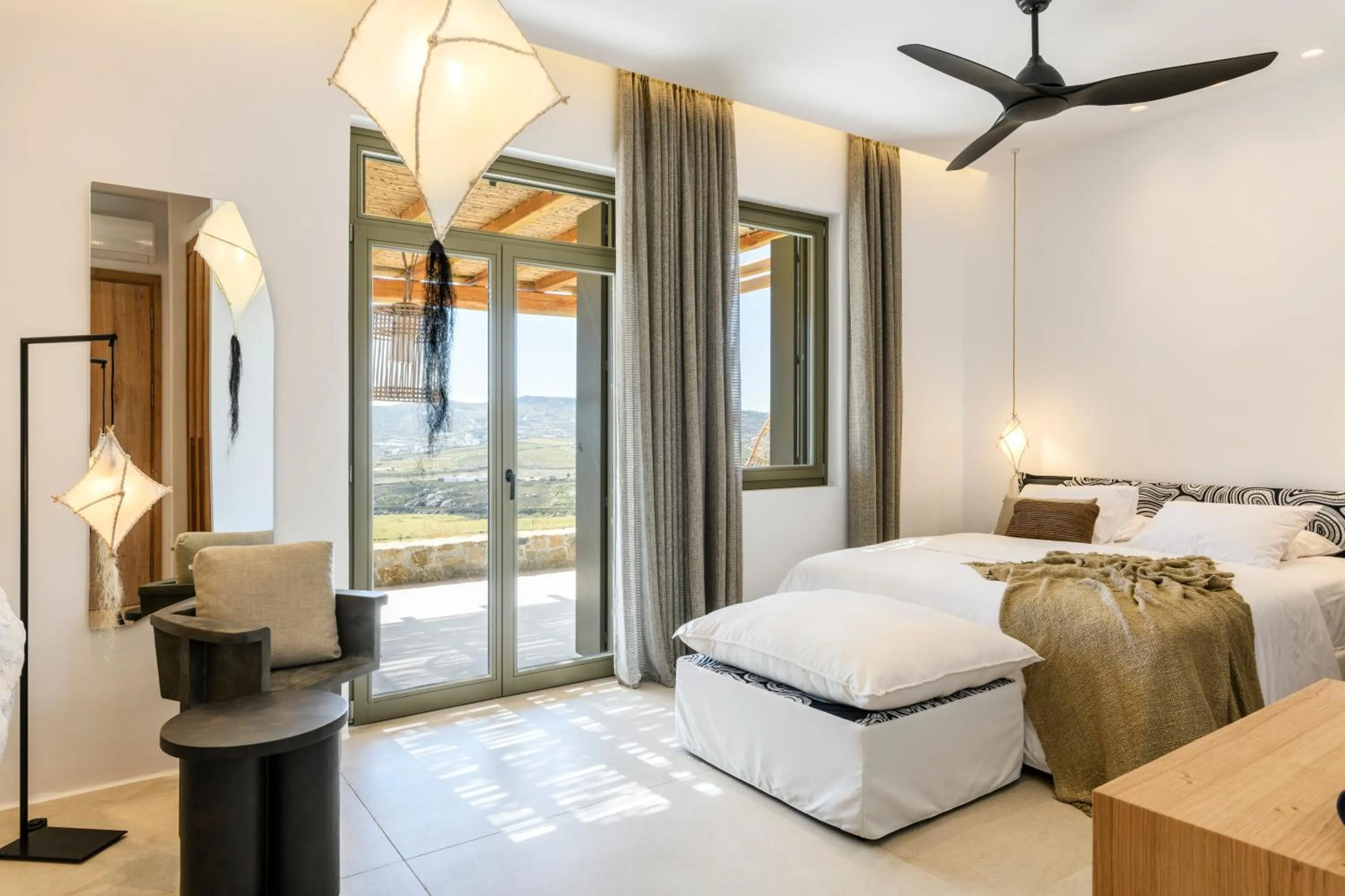 Bed in Nasta Suites & Villas Intentional Living Mykonos