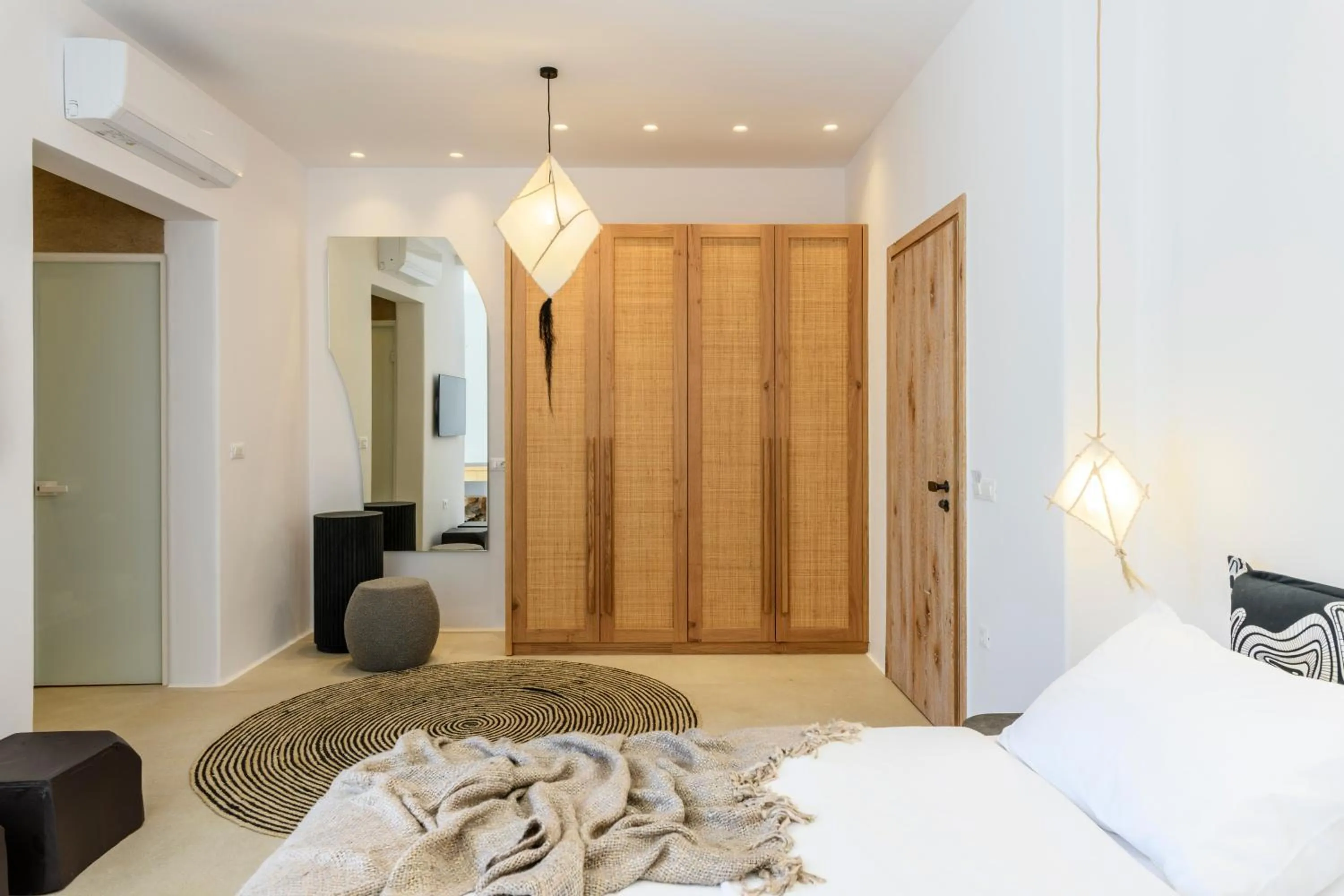 Bed in Nasta Suites & Villas Intentional Living Mykonos