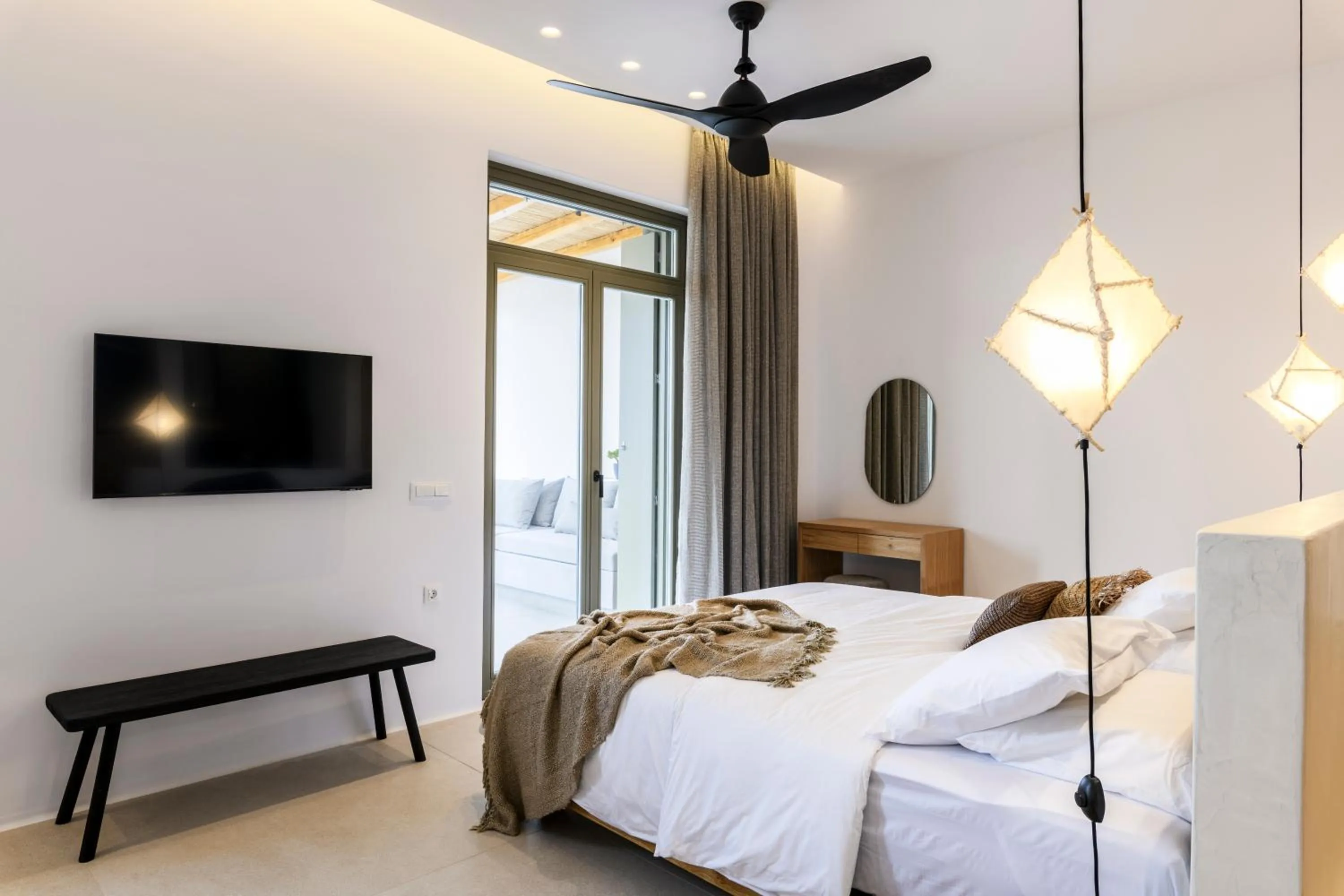 Bed in Nasta Suites & Villas Intentional Living Mykonos