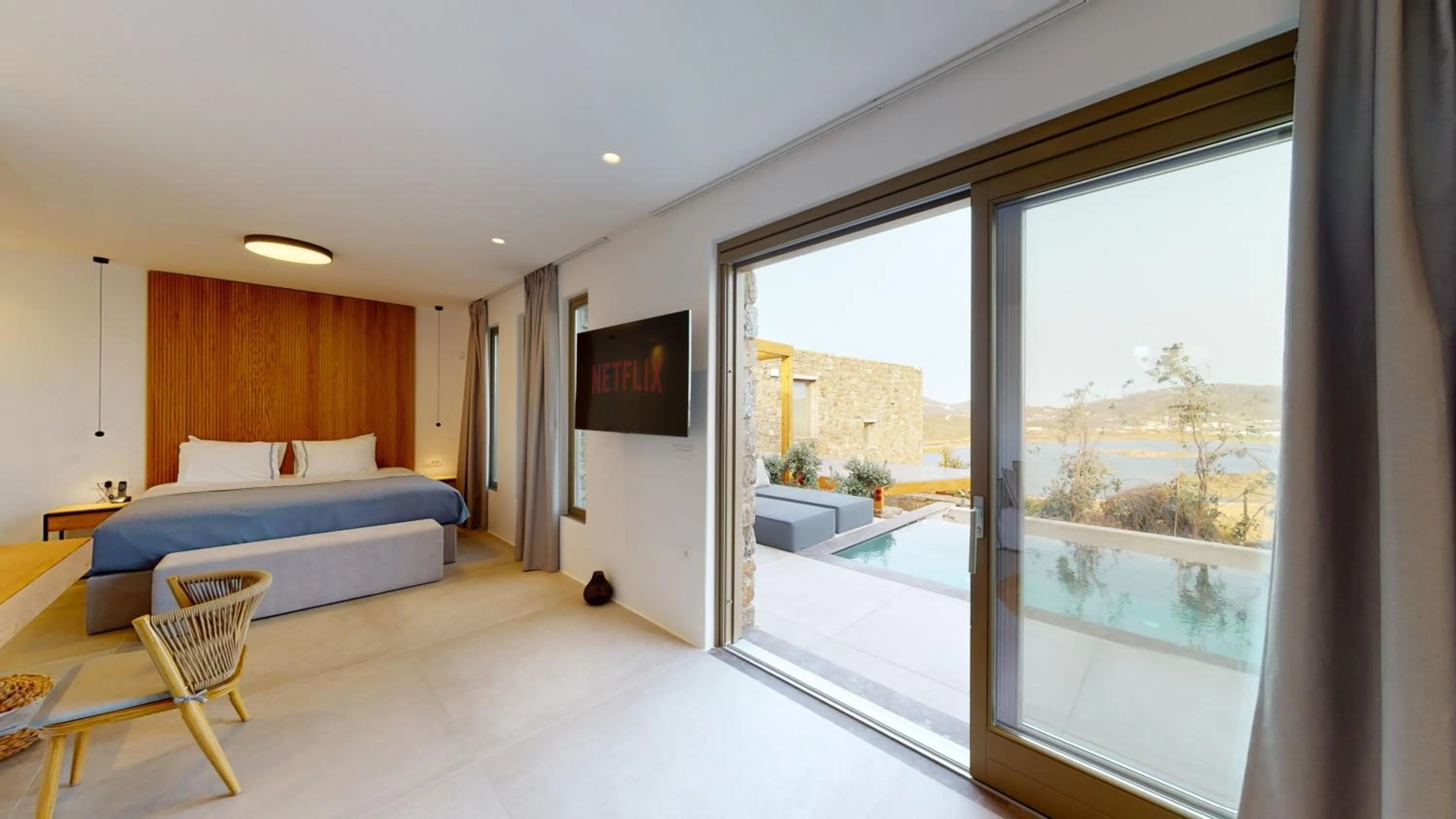 Bed in Nasta Suites & Villas Intentional Living Mykonos