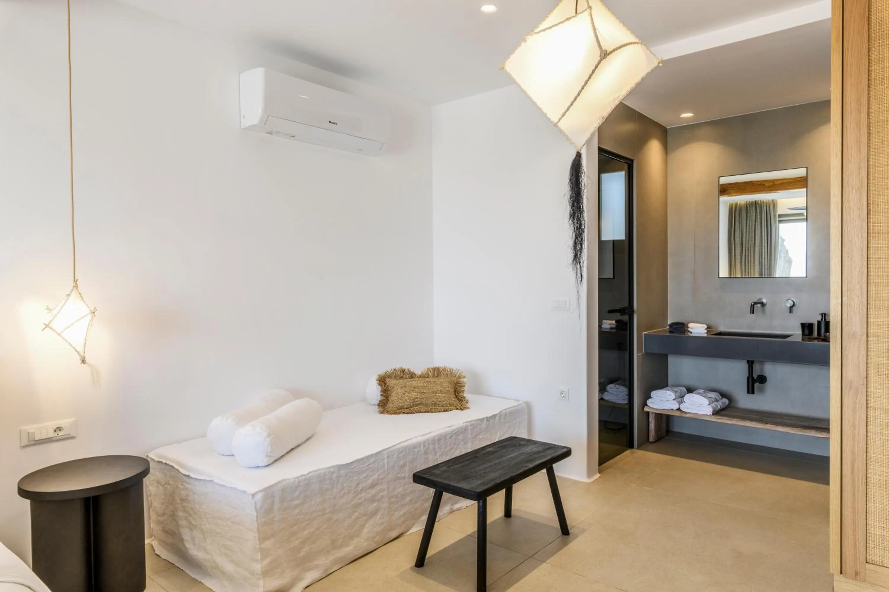 Living room, Bed in Nasta Suites & Villas Intentional Living Mykonos