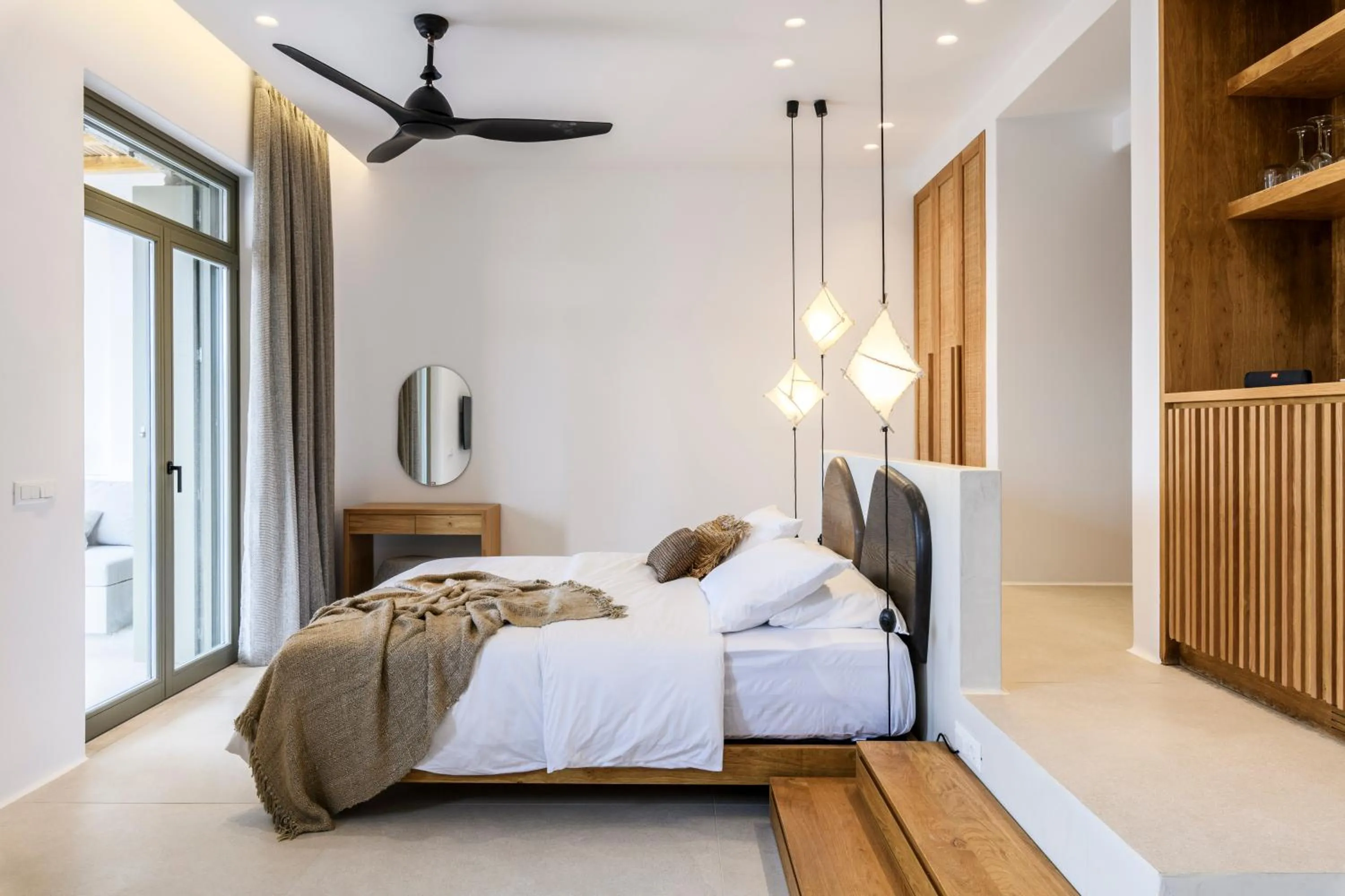 Bed in Nasta Suites & Villas Intentional Living Mykonos