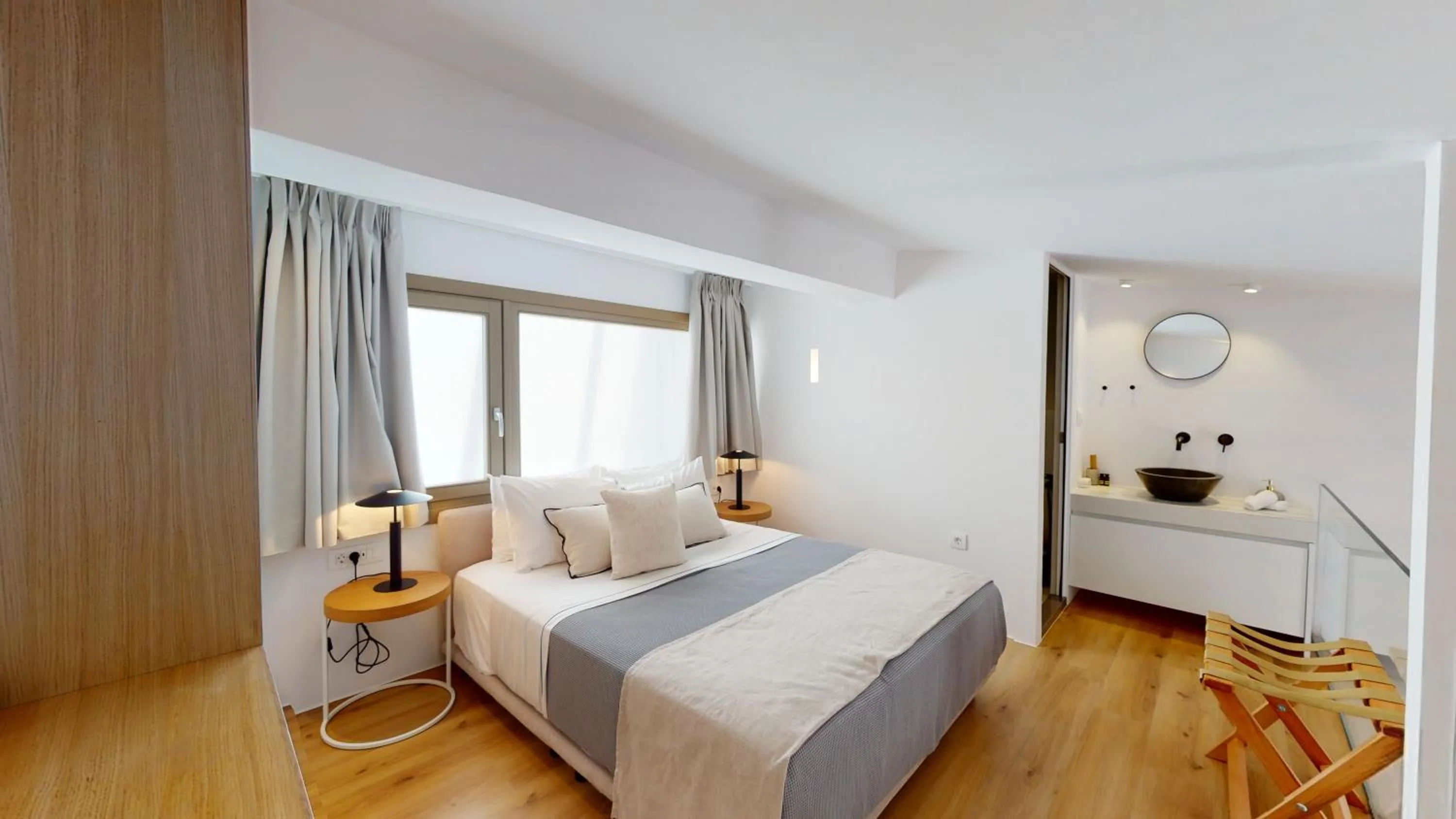 Bed in Nasta Suites & Villas Intentional Living Mykonos