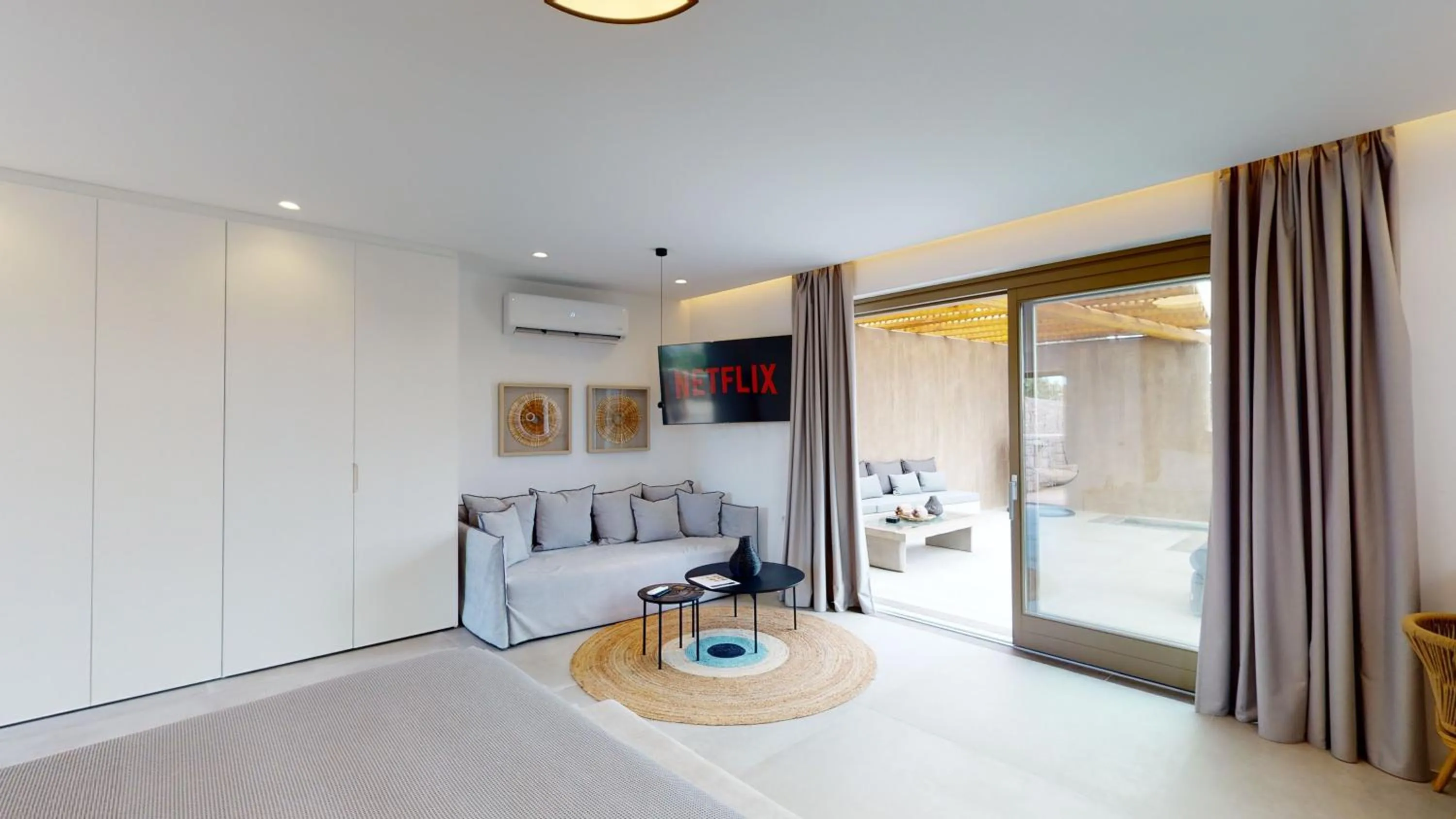 TV and multimedia, Bed in Nasta Suites & Villas Intentional Living Mykonos