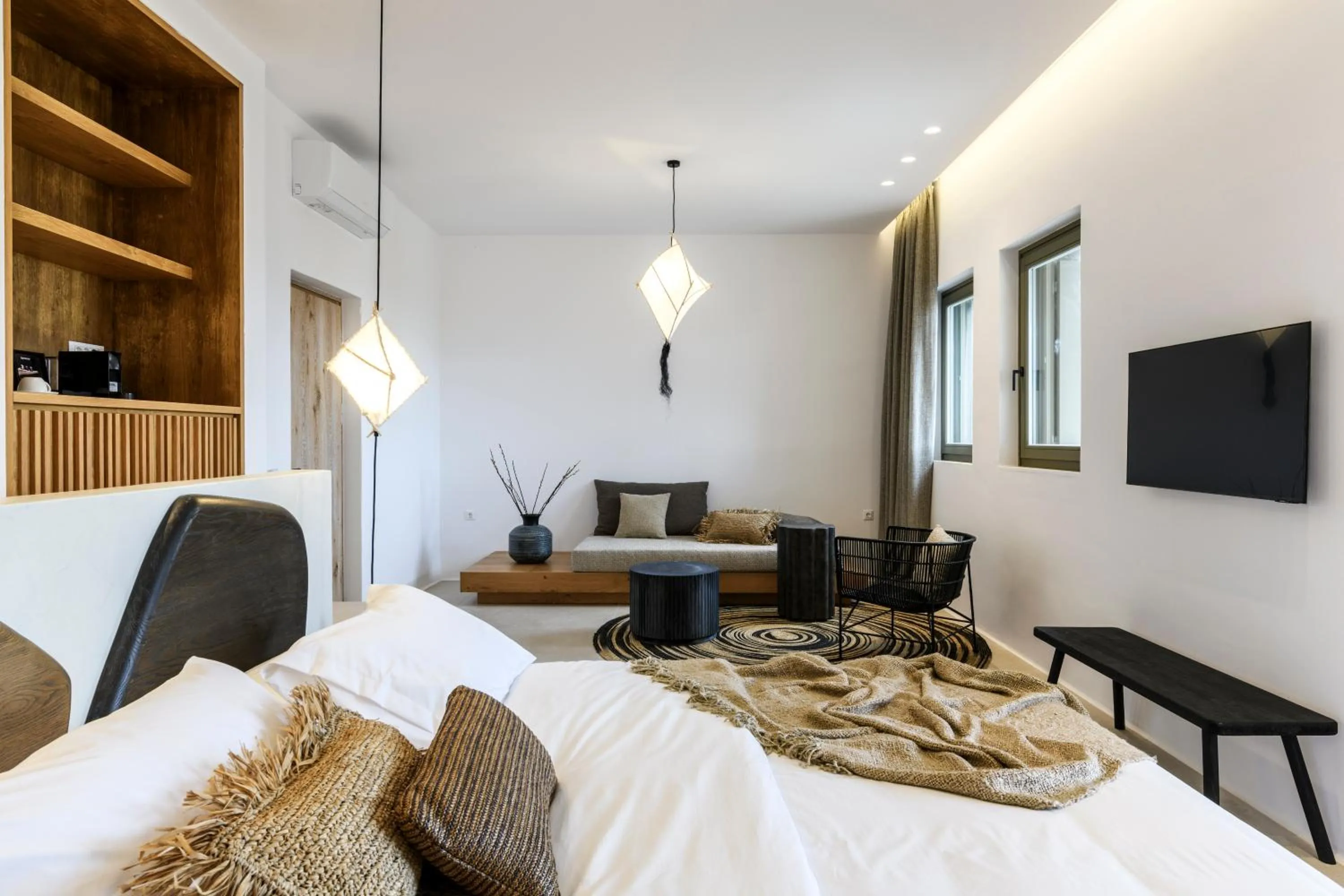 Bed in Nasta Suites & Villas Intentional Living Mykonos