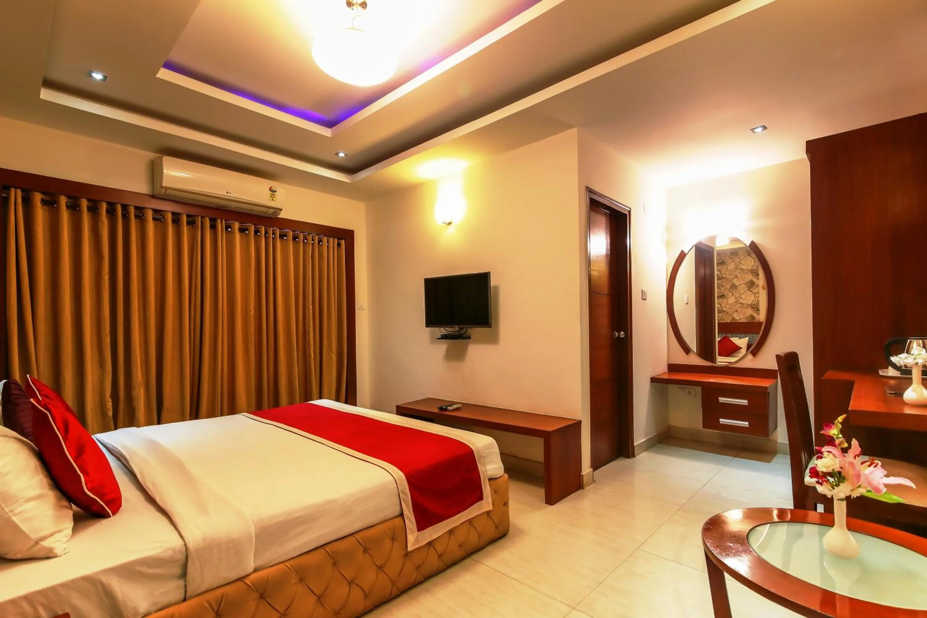 Living room, Bed in Icon Suites by Bhagini