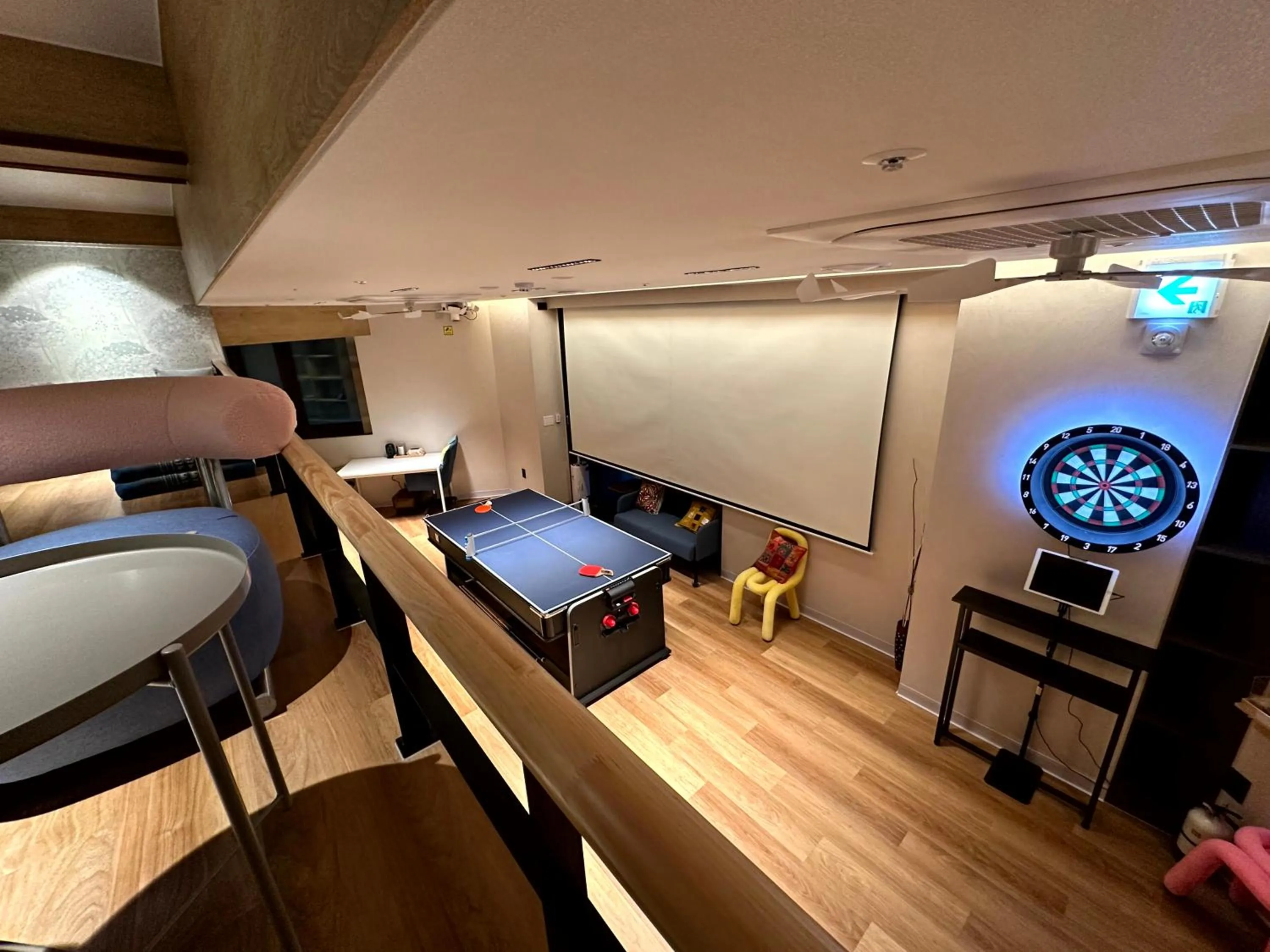 Communal lounge/ TV room in Nomad Live Hostel