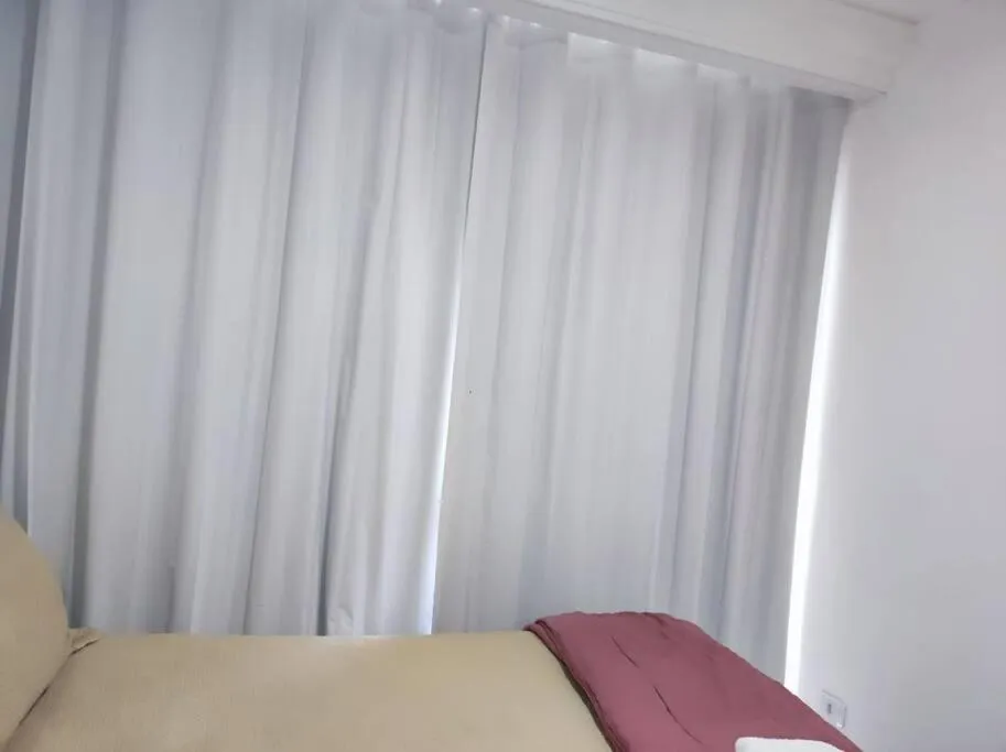 Bed in Majestoso Apartamento Central