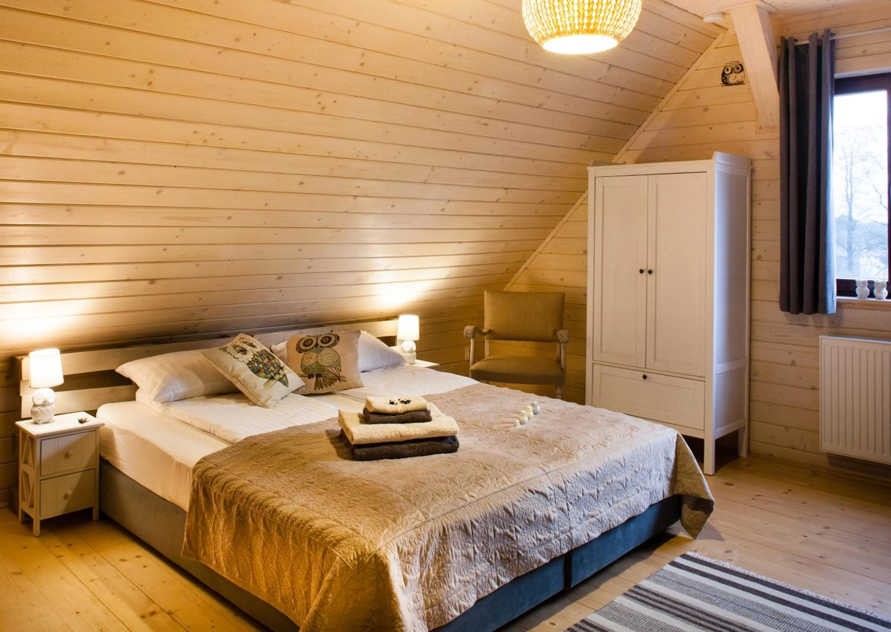 Bed in Sirvis Apartamenty