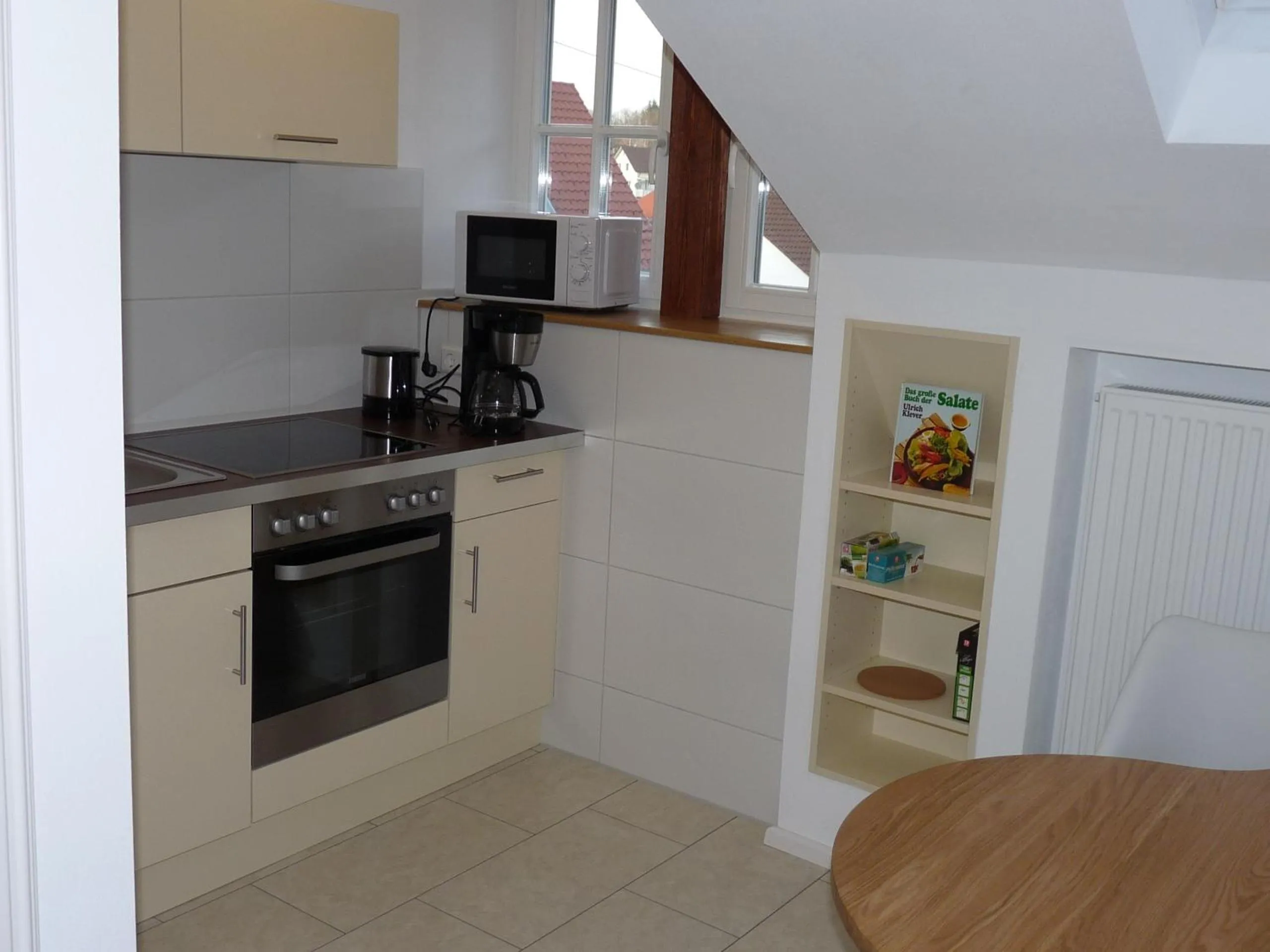 Kitchen or kitchenette in Gästehaus "Unsere Stadtvilla" Hechingen