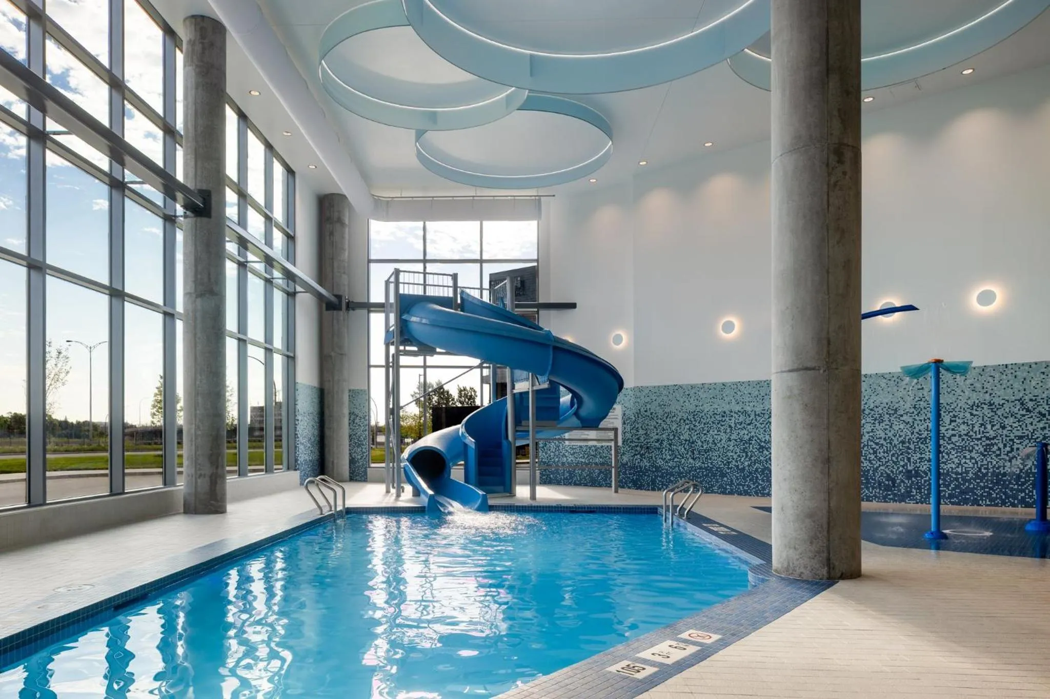 Swimming pool in Holiday Inn Express Montreal Airport - St-Laurent by IHG